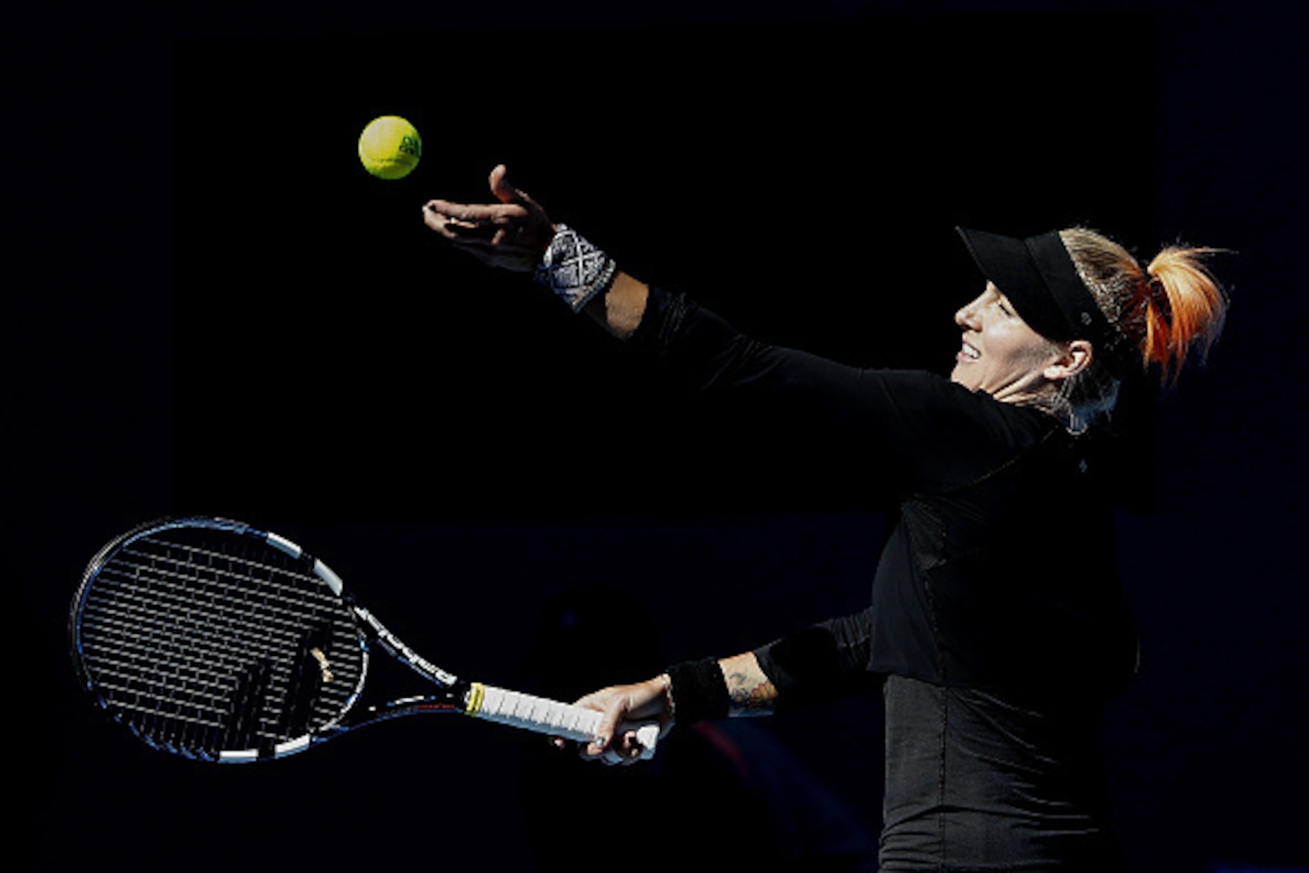 BEIJING, CHINA - OCTOBER 08: Bethanie Mattek-Sands of the United States serves to Roberta Vinci of Italy during the Women's singles Second round match on day six of the 2015 China Open at the China National Tennis Centre on October 8, 2015 in Beijing, Ch BEIJING, CHINA - OCTOBER 08: Bethanie Mattek-Sands of the United States serves to Roberta Vinci of Italy during the Women's singles Second round match on day six of the 2015 China Open at the China National Tennis Centre on October 8, 2015 in Beijing, Ch