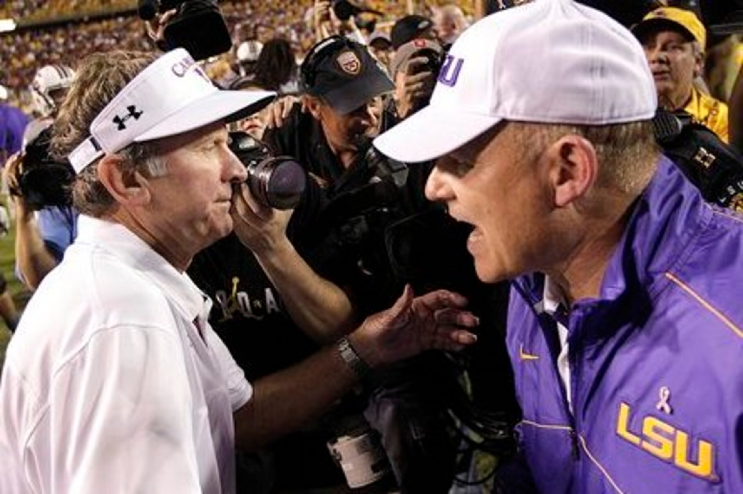 South Carolina head coach Steve Spurrier (left) and LSU head coach Les Miles (right)