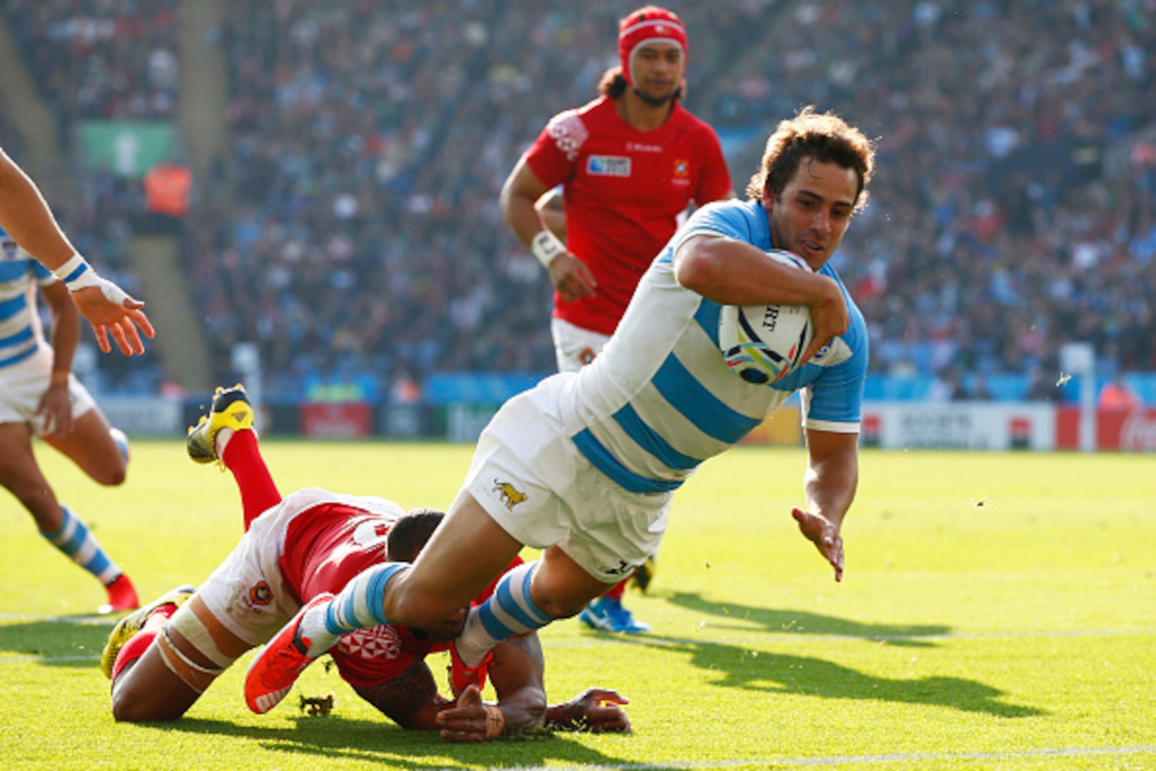 LEICESTER, ENGLAND - OCTOBER 04: Nicolas Sanchez of Argentina dives over for their third try during the 2015 Rugby World Cup Pool C match between Argentina and Tonga at Leicester City Stadium on October 4, 2015 in Leicester, United Kingdom. (Photo by St LEICESTER, ENGLAND - OCTOBER 04: Nicolas Sanchez of Argentina dives over for their third try during the 2015 Rugby World Cup Pool C match between Argentina and Tonga at Leicester City Stadium on October 4, 2015 in Leicester, United Kingdom. (Photo by St