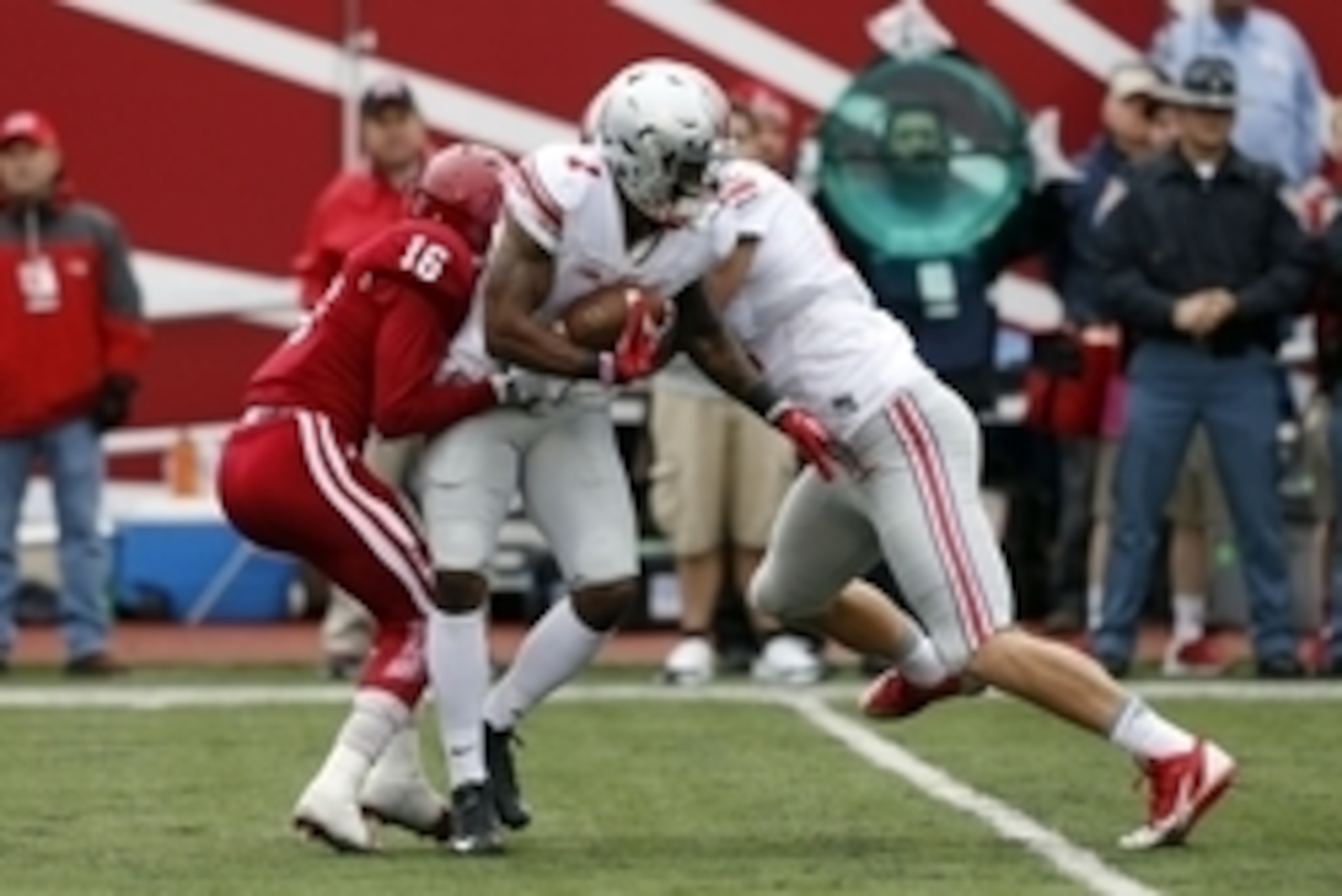 Oct 3, 2015; Bloomington, IN, USA; Ohio State Buckeyes h back Braxton Miller (1) is tackled by Indiana Hoosiers cornerback Rashard Fant (16) at Memorial Stadium. Mandatory Credit: Brian Spurlock-USA TODAY Sports Oct 3, 2015; Bloomington, IN, USA; Ohio State Buckeyes h back Braxton Miller (1) is tackled by Indiana Hoosiers cornerback Rashard Fant (16) at Memorial Stadium. Mandatory Credit: Brian Spurlock-USA TODAY Sports