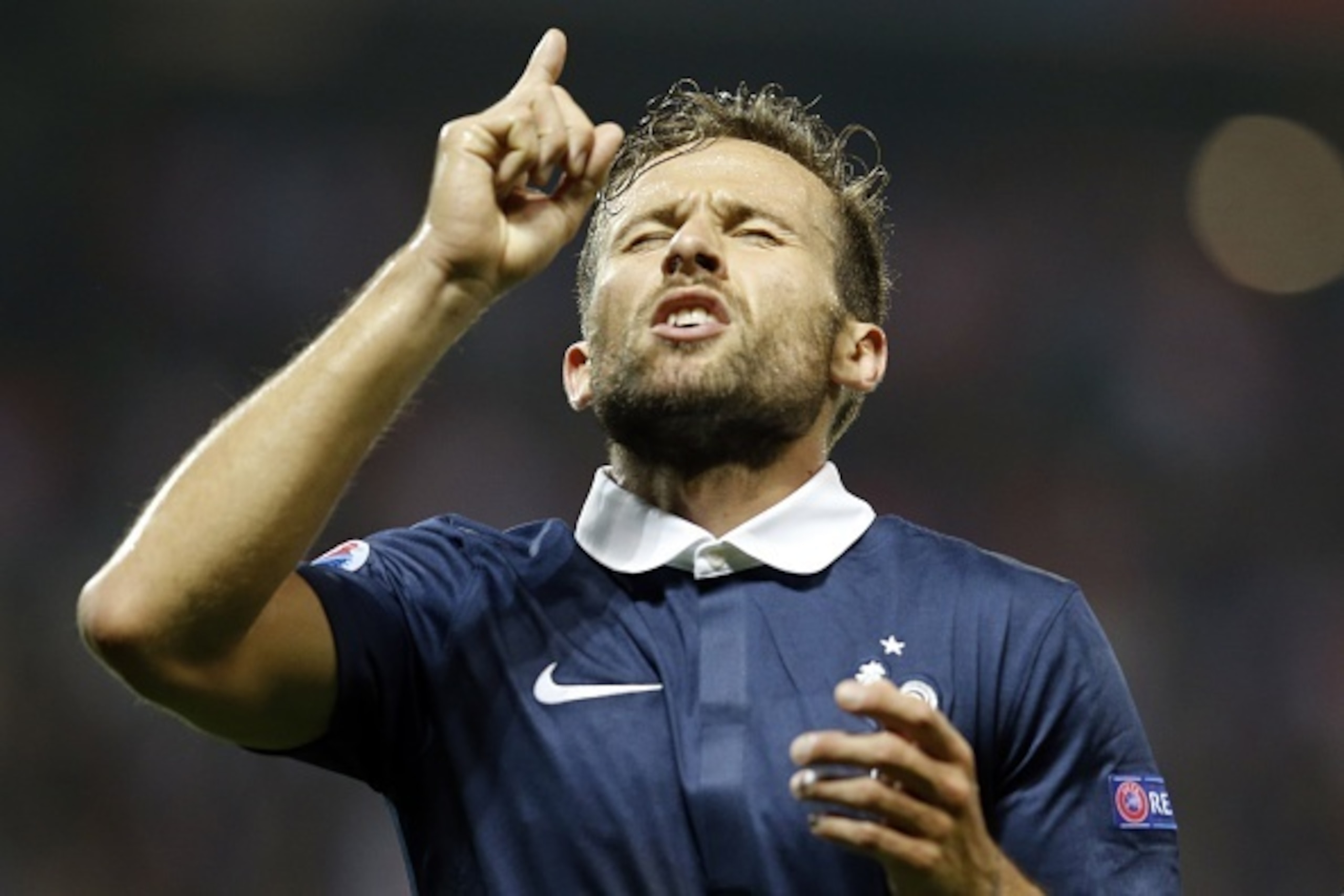 France's midfielder Yohan Cabaye celebrates after scoring a goal during the friendly football match between France and Armenia on October 8, 2015 at the Allianz Riviera stadium in Nice, southeastern France. AFP PHOTO / VALERY HACHE        (Photo credit sh