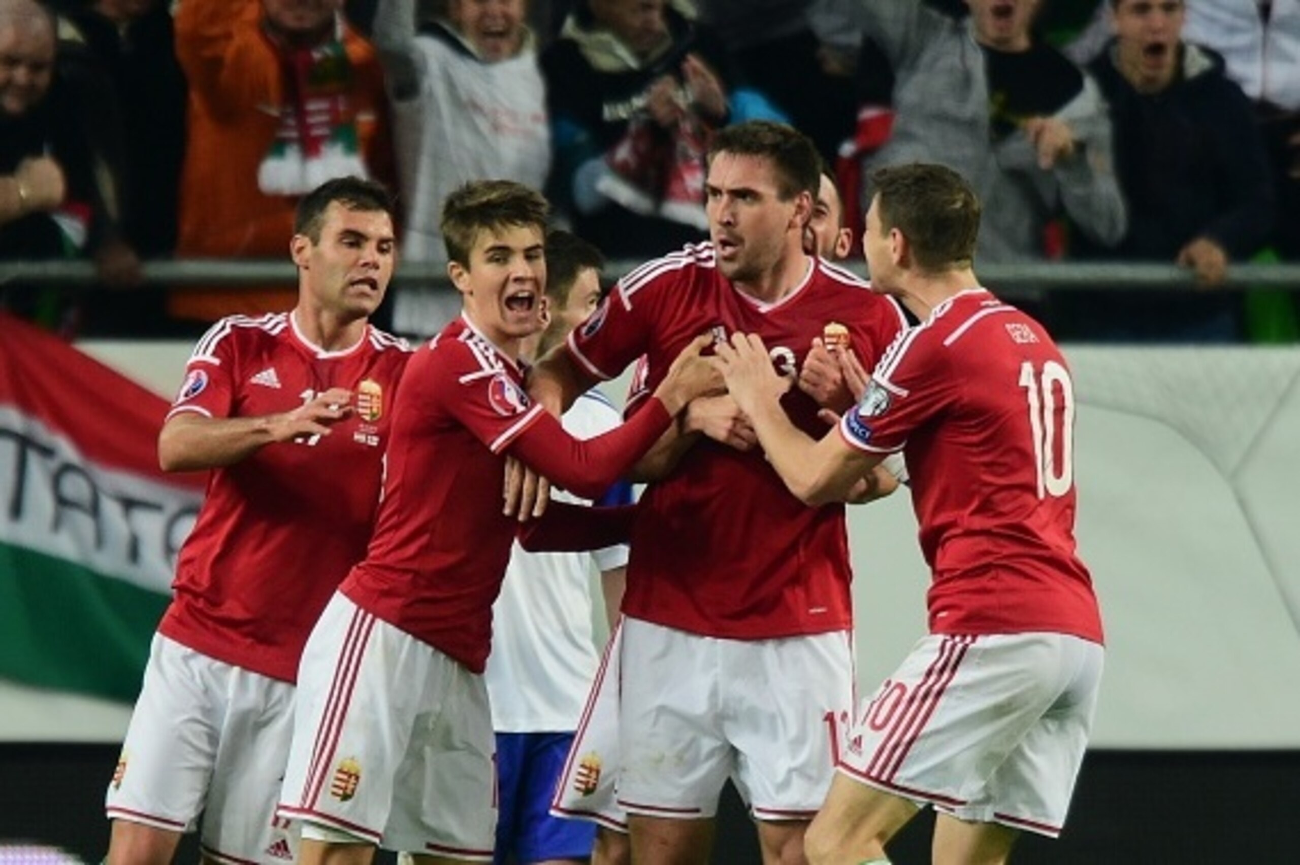 Hungary's Daniel Bode (2nd R) celebrates scoring with his team-mates during the Euro 2016 Group F qualifying football match between Hungary and Faroe Islands at the Groupama Arena in Budapest, Hungary on October 8, 2015. AFP PHOTO / ATTILA KISBENEDEK     