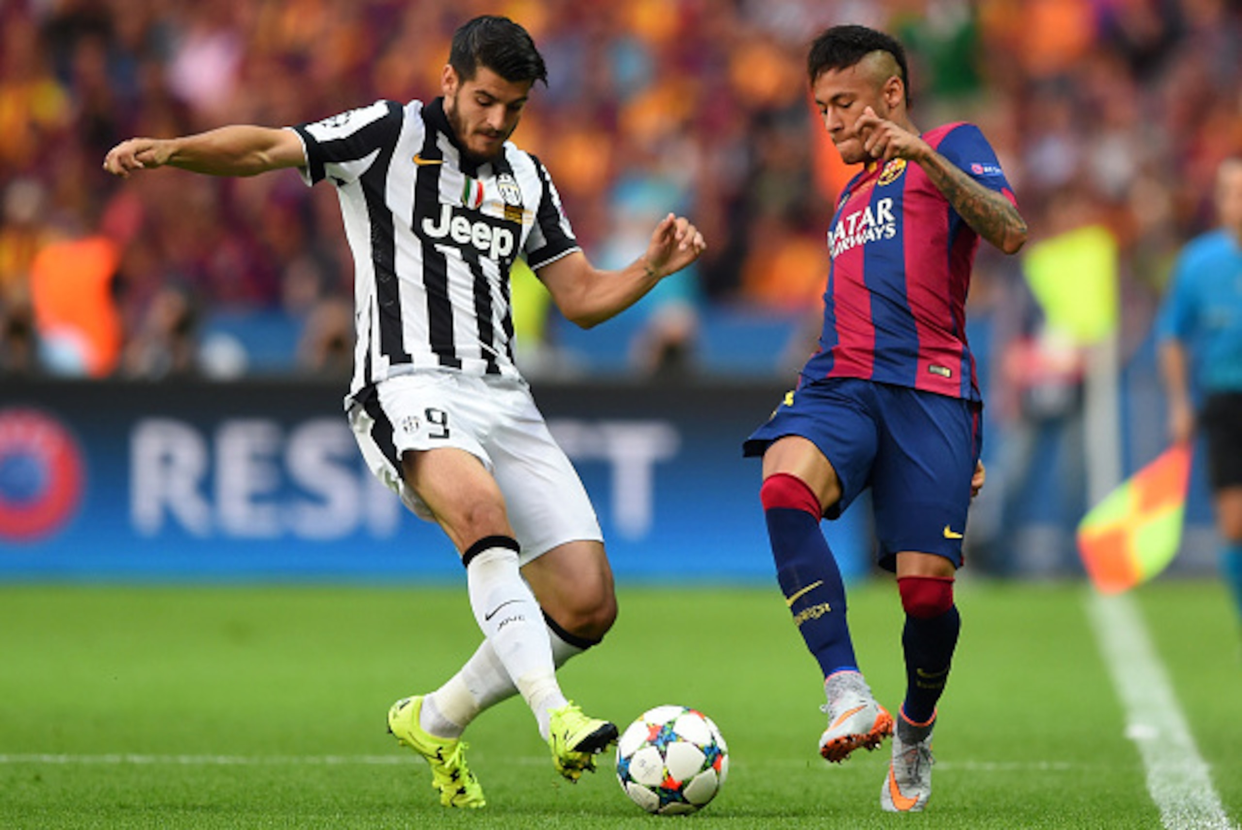 BERLIN, GERMANY - JUNE 06: Alvaro Morata of Juventus challenges Neymar of Barcelona during the UEFA Champions League Final between Juventus and FC Barcelona at Olympiastadion on June 6, 2015 in Berlin, Germany.  (Photo by Shaun Botterill/Getty Images)