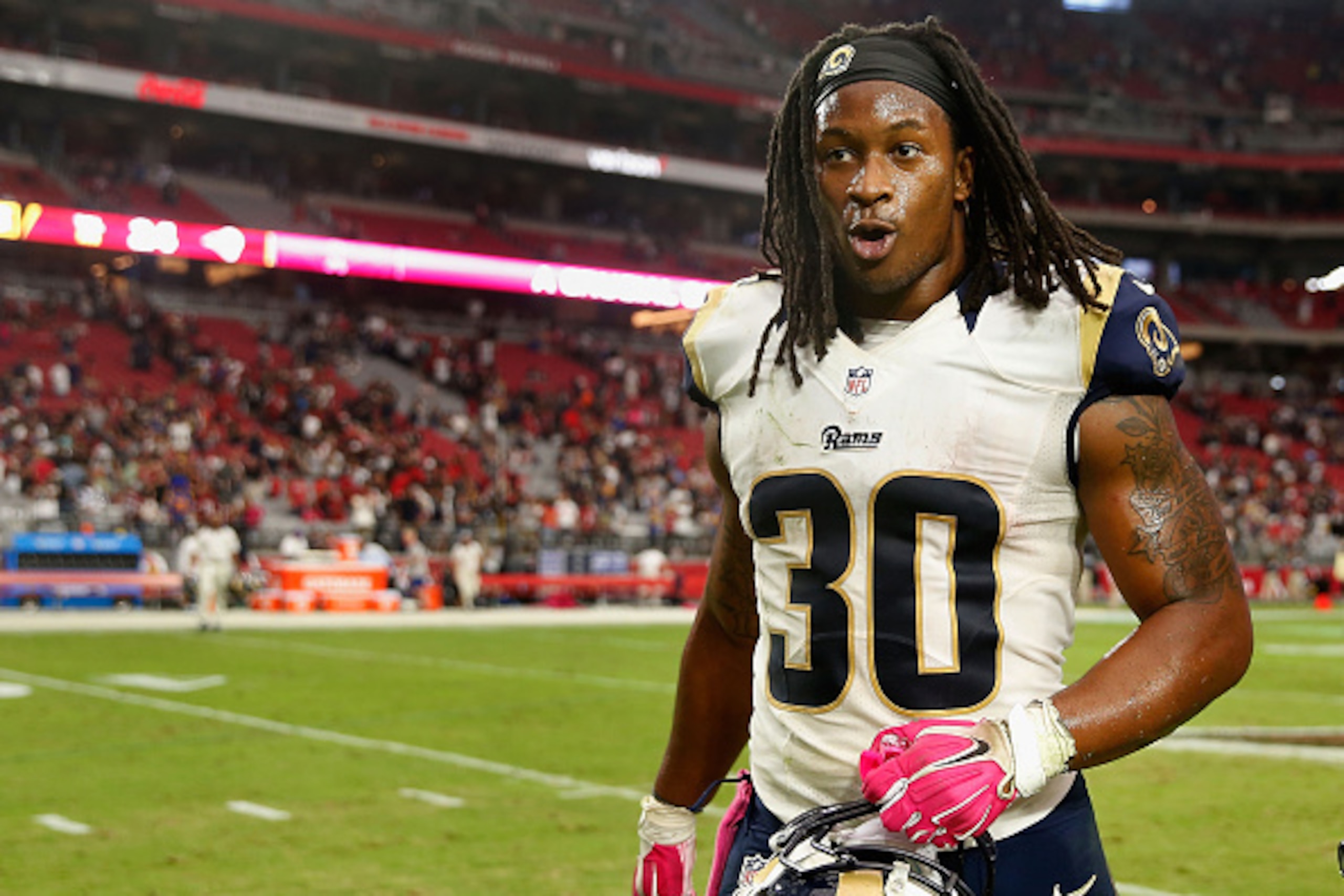 GLENDALE, AZ - OCTOBER 04:  Running back Todd Gurley #30 of the St. Louis Rams walks off the field following the NFL game against the Arizona Cardinals at the University of Phoenix Stadium on October 4, 2015 in Glendale, Arizona. The Rams defeated the Car