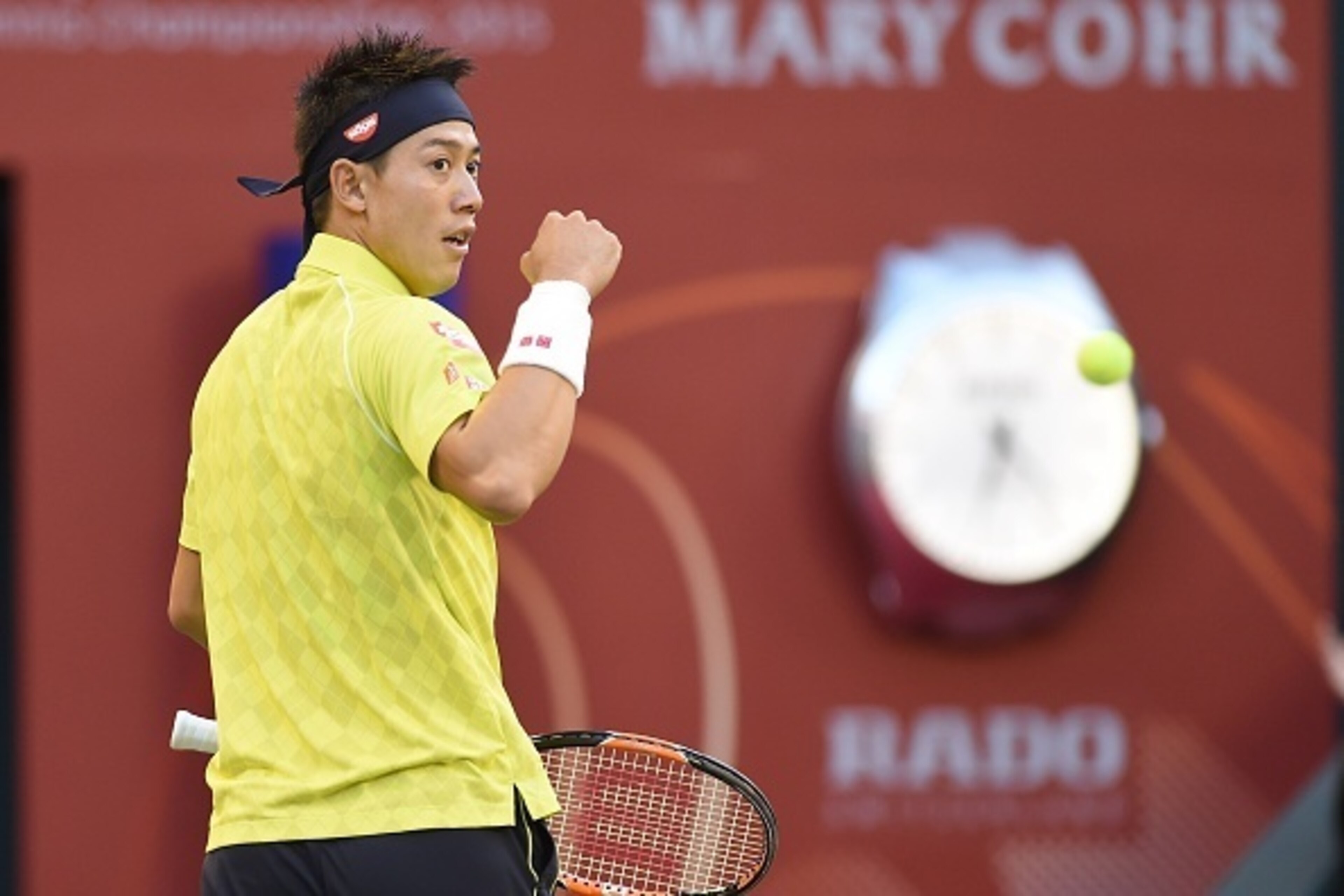 Kei Nishikori of Japan reacts after winning a point against Marin Cilic of Croatia during their quarter-final match at the Japan Open tennis tournament in Tokyo on October 9, 2015.      AFP PHOTO / Toru YAMANAKA        (Photo credit should read TORU YAMAN