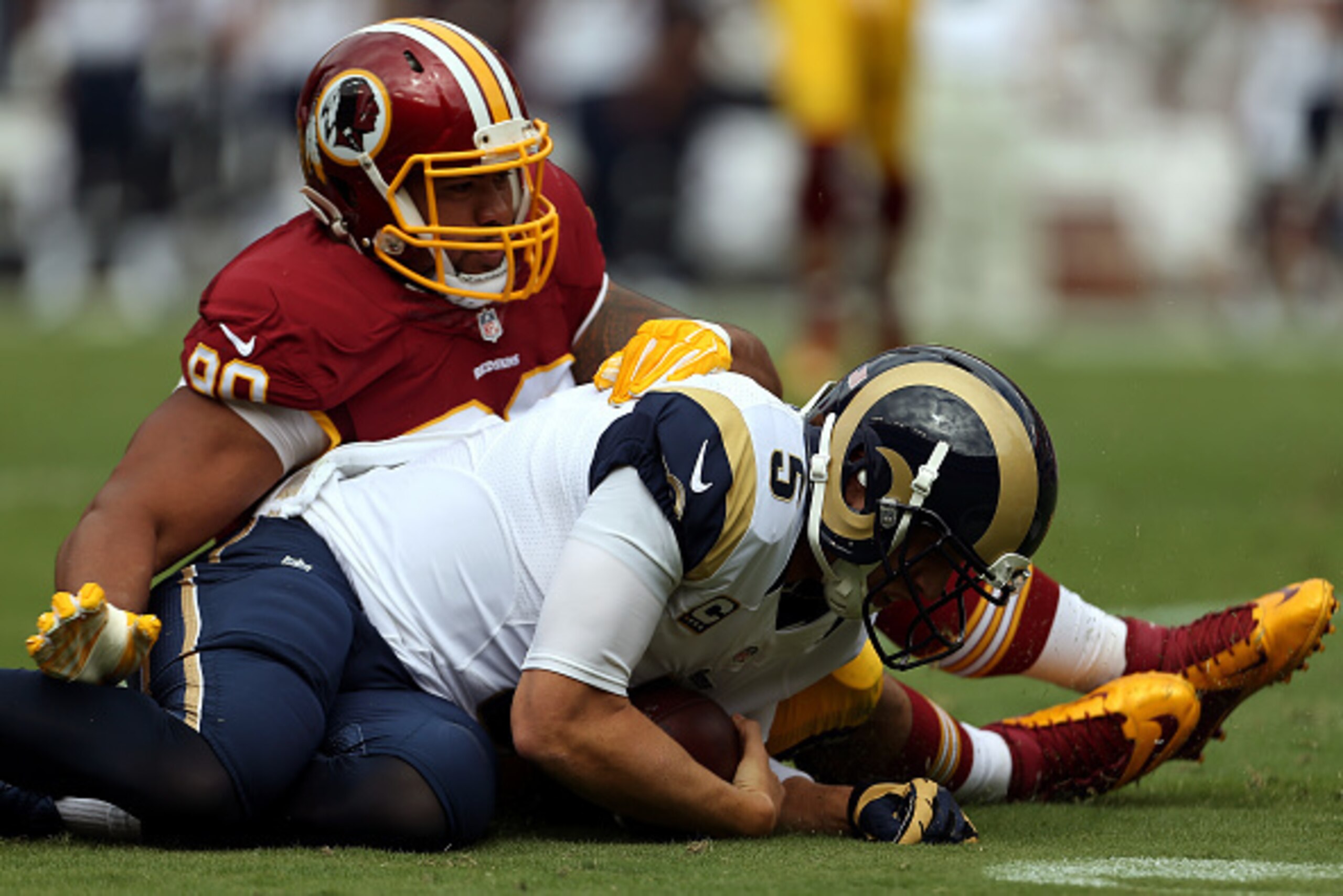 LANDOVER, MD - SEPTEMBER 20: Quarterback Nick Foles #5 of the St. Louis Rams is tackled by defensive end Stephen Paea #90 of the Washington Redskins after recovering a loose ball in the first quarter of a game at FedExField on September 20, 2015 in Landov LANDOVER, MD - SEPTEMBER 20: Quarterback Nick Foles #5 of the St. Louis Rams is tackled by defensive end Stephen Paea #90 of the Washington Redskins after recovering a loose ball in the first quarter of a game at FedExField on September 20, 2015 in Landov
