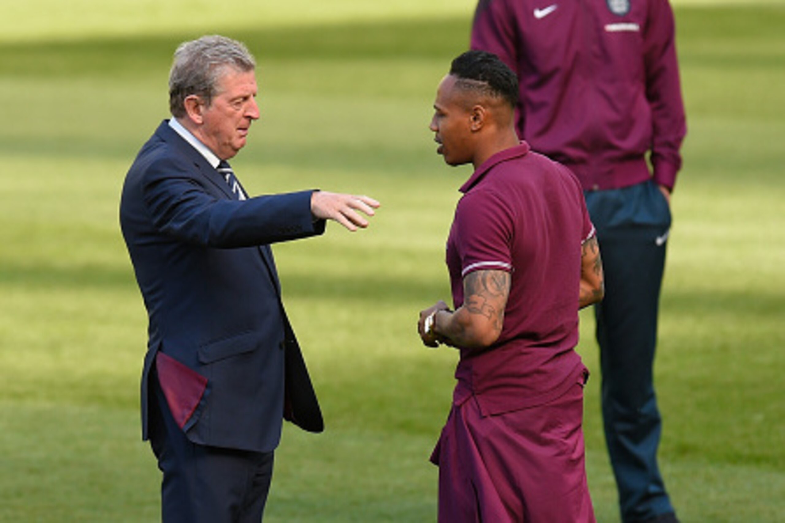 DUBLIN, IRELAND - JUNE 06:  England coach Roy Hodgson (l) has a chat with Nathaniel Clyne on the pitch ahead of Sunday's friendly internmational against the Republic of Ireland at Aviva Stadium on June 6, 2015 in Dublin, Ireland.  (Photo by Stu Forster/Ge