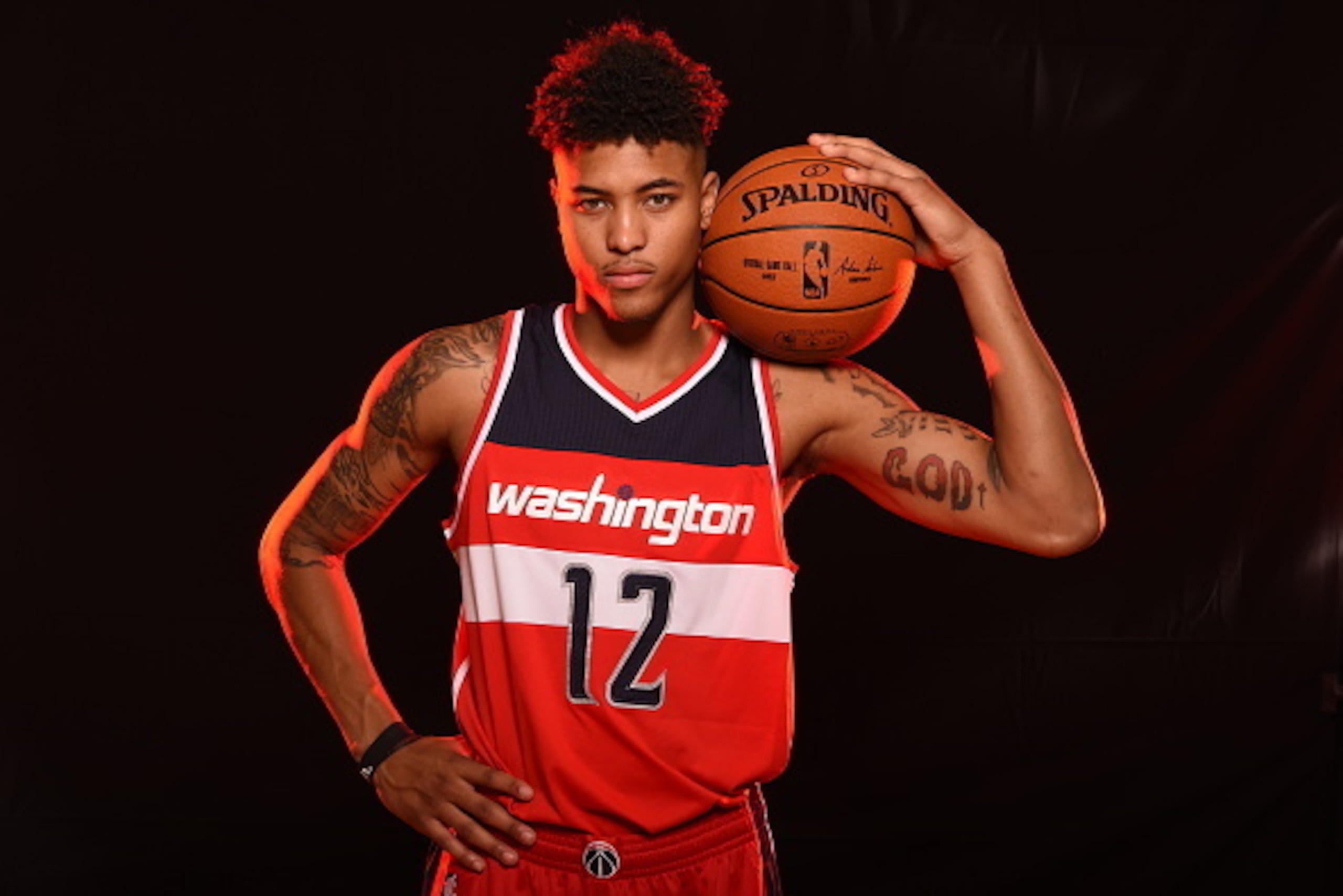 TARRYTOWN, NY - AUGUST 8: Kelly Oubre Jr. #12 of the Washington Wizards poses for a portrait during the 2015 NBA rookie photo shoot on August 8, 2015 at the Madison Square Garden Training Facility in Tarrytown, New York. NOTE TO USER: User expressly ackno