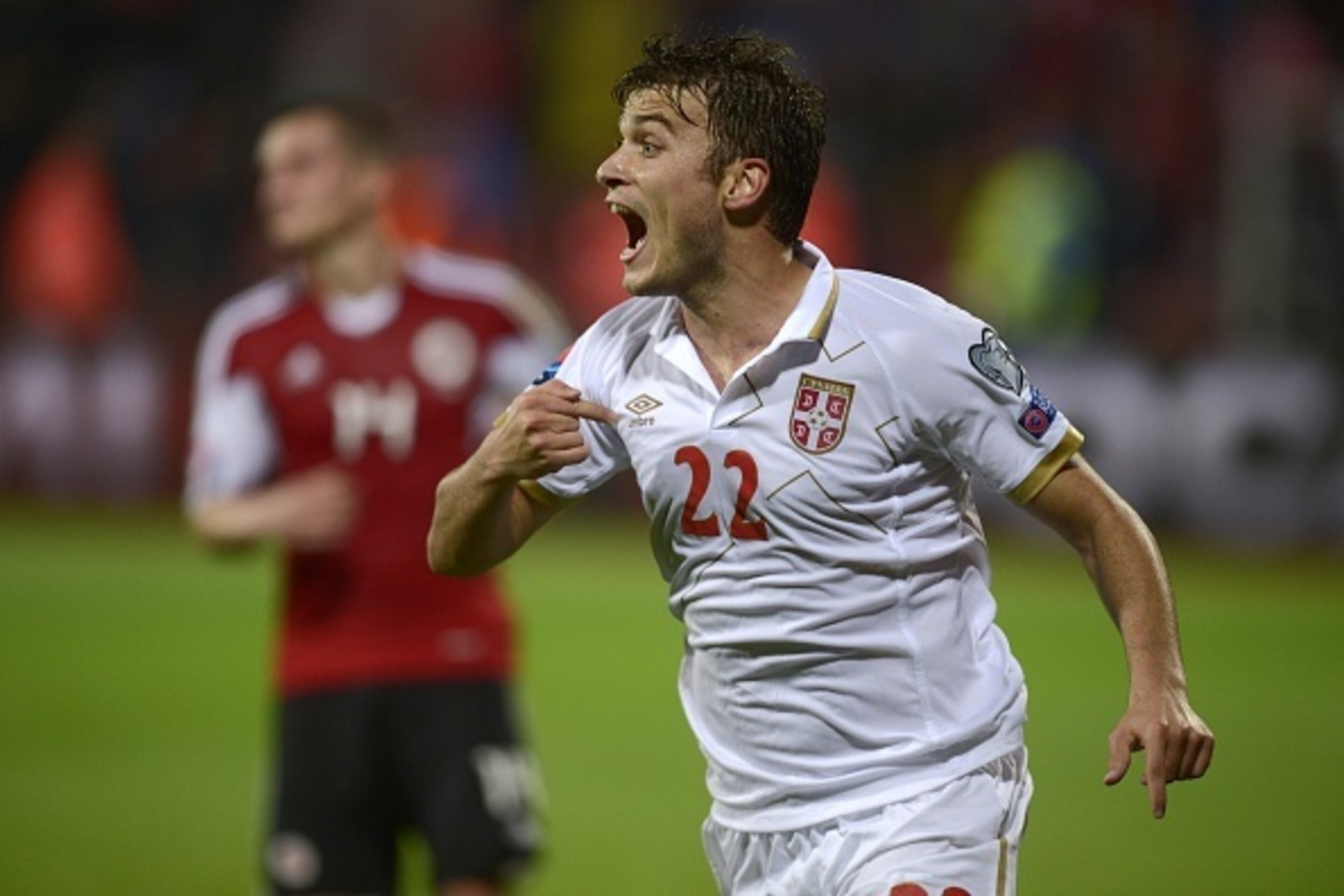 Serbia's midfielder Adem Ljajic celebrates after scoring during the Euro 2016 Group I qualifying football match between Albania and Serbia at the Elbasan Arena stadium in Elbasan on October 8, 2015.     AFP PHOTO / NIKOLAY DOYCHINOV        (Photo credit s