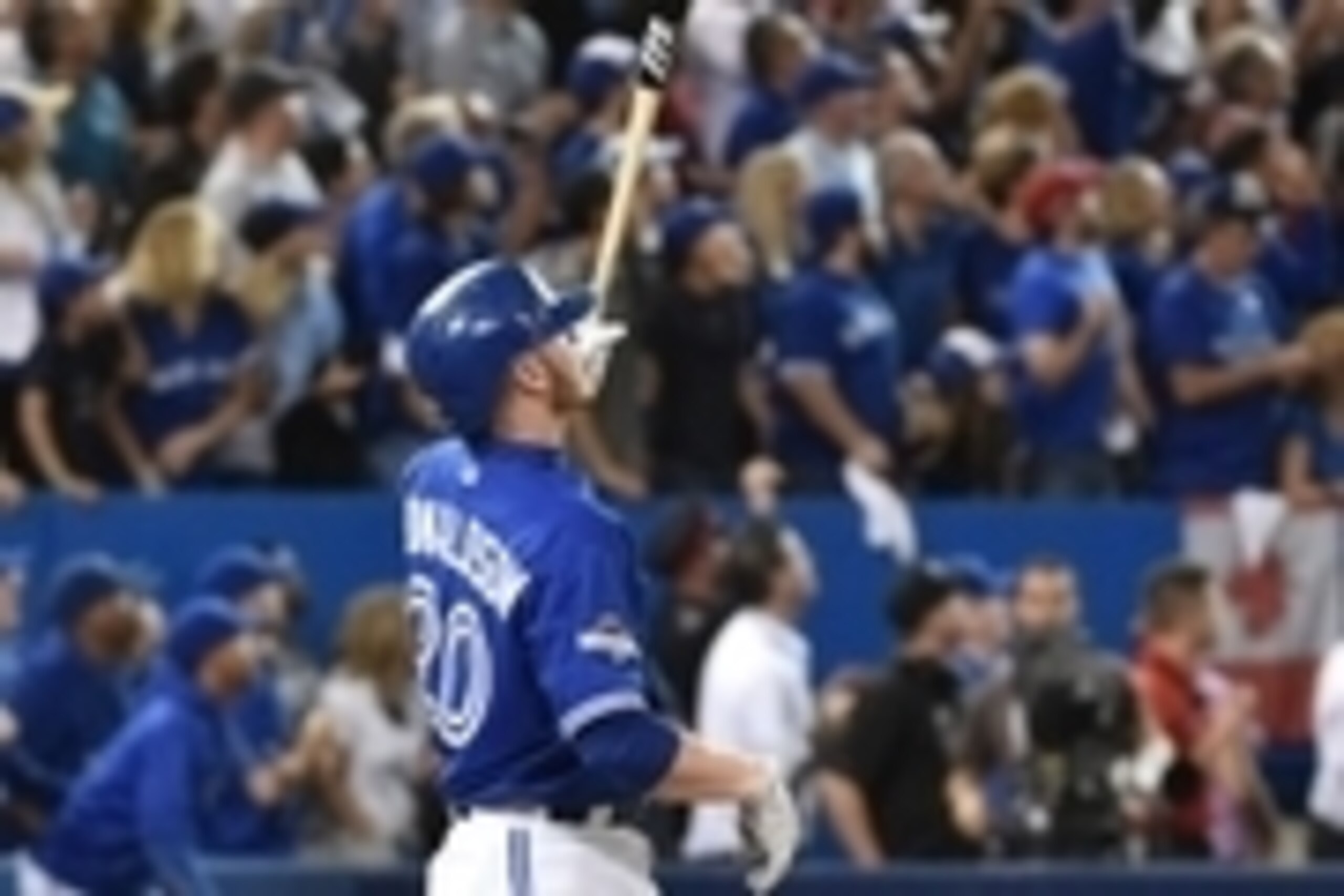 Oct 9, 2015; Toronto, Ontario, CAN; Toronto Blue Jays third baseman Josh Donaldson hits a foul ball against the Texas Rangers in the 13th inning in game two of the ALDS at Rogers Centre. Mandatory Credit: Nick Turchiaro-USA TODAY Sports