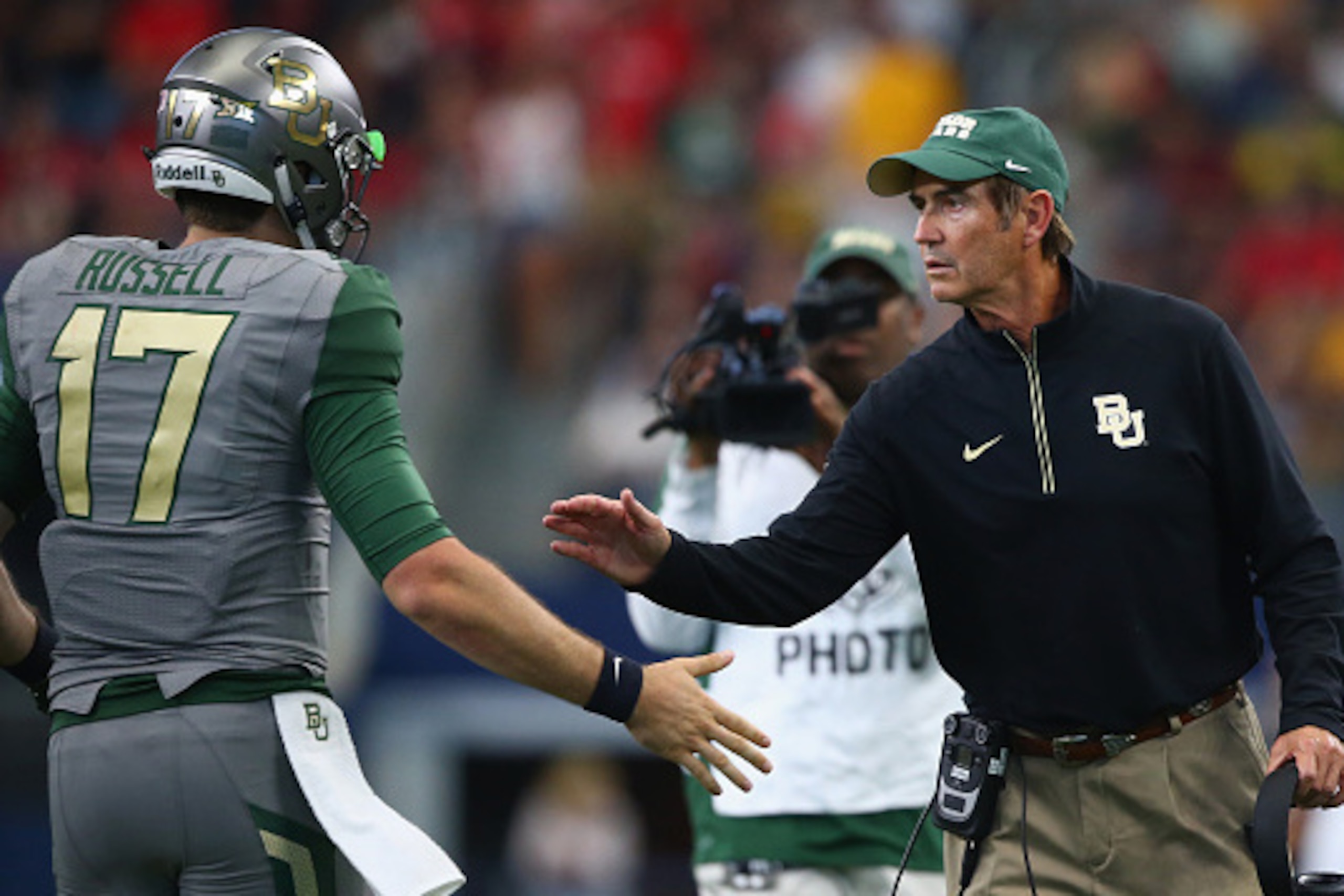 ARLINGTON, TX - OCTOBER 03:  Seth Russell #17 of the Baylor Bears celebrates his touchdown with Art Briles in the second quarter against the Texas Tech Red Raiders at AT&T Stadium on October 3, 2015 in Arlington, Texas.  (Photo by Ronald Martinez/Getty Im