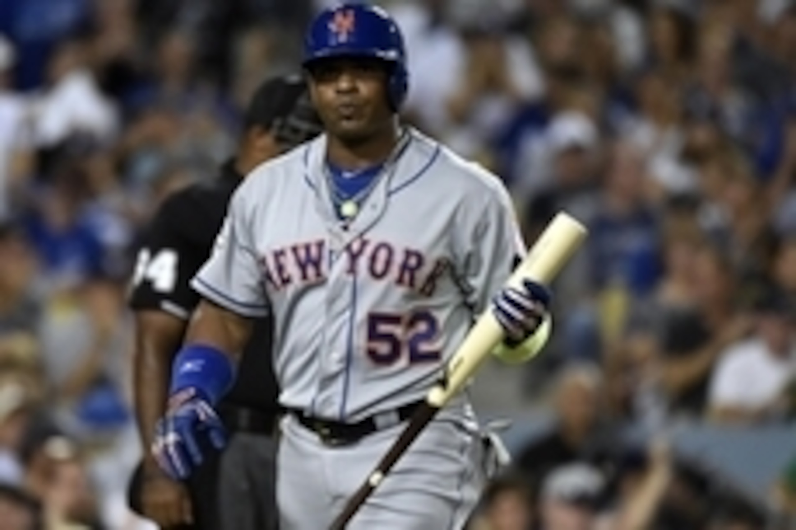 October 9, 2015; Los Angeles, CA, USA; New York Mets center fielder Yoenis Cespedes (52) reacts after striking out in the first inning against the Los Angeles Dodgers in game one of the NLDS at Dodger Stadium. Mandatory Credit: Richard Mackson-USA TODAY S
