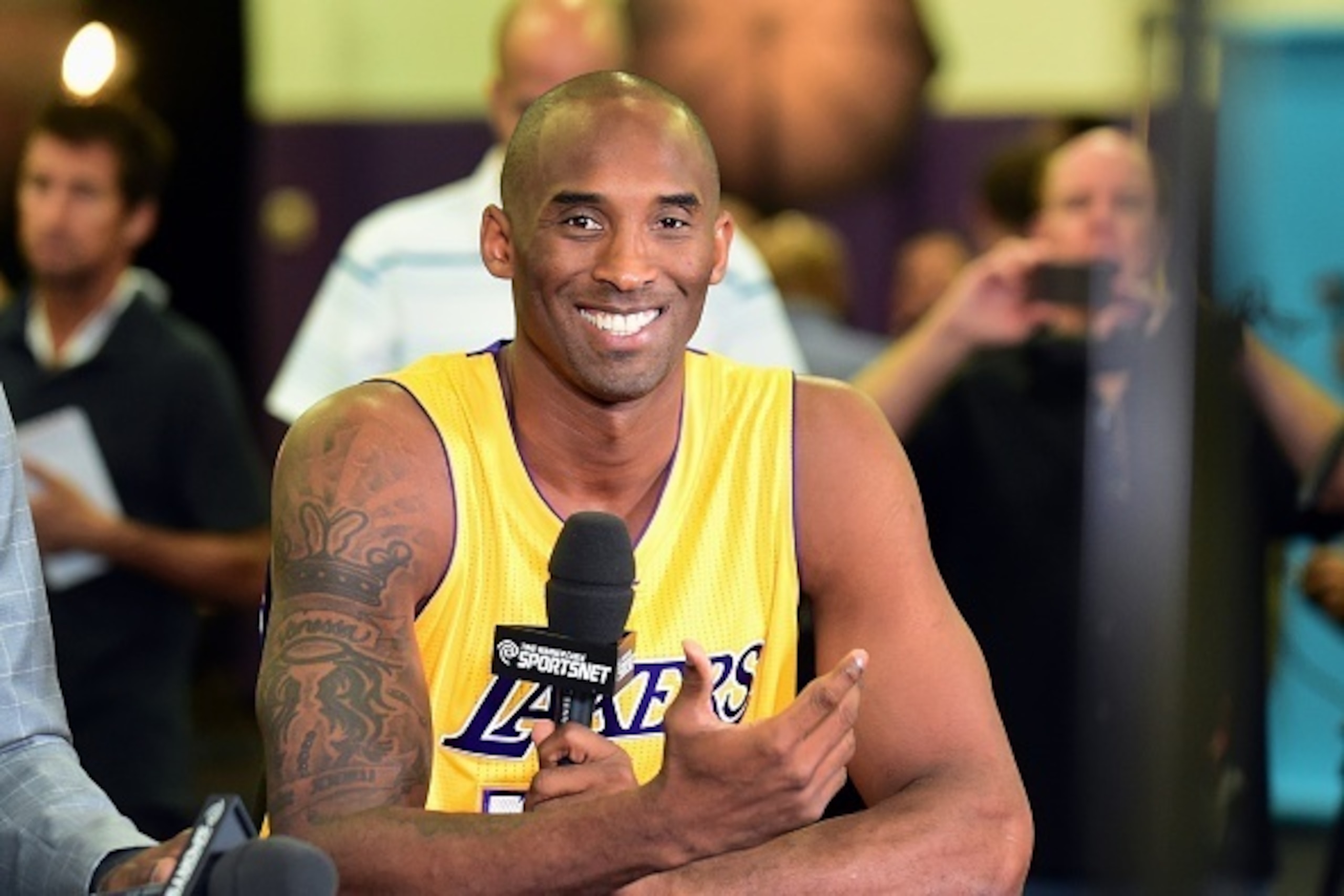 Kobe Bryant of the Los Angeles Lakers is interviewed during the Los Angeles Lakers media day on September 28, 2015 in El Segundo, California. AFP PHOTO / FREDERIC J. BROWN        (Photo credit should read FREDERIC J. BROWN/AFP/Getty Images)