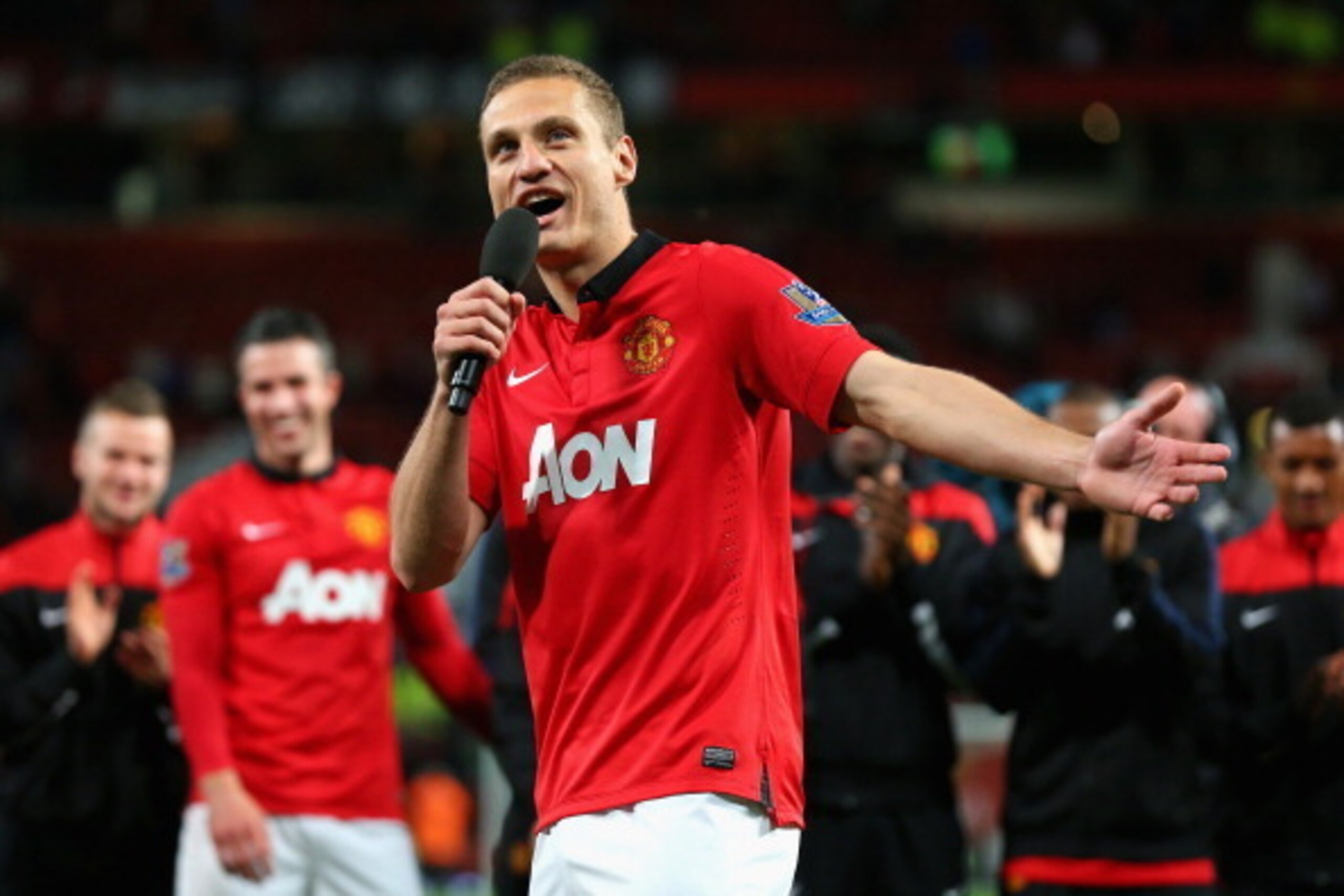 MANCHESTER, ENGLAND - MAY 06:  Nemanja Vidic of Manchester United speaks to the fans after his final home game for the club at the end of the Barclays Premier League match between Manchester United and Hull City at Old Trafford on May 6, 2014 in Mancheste