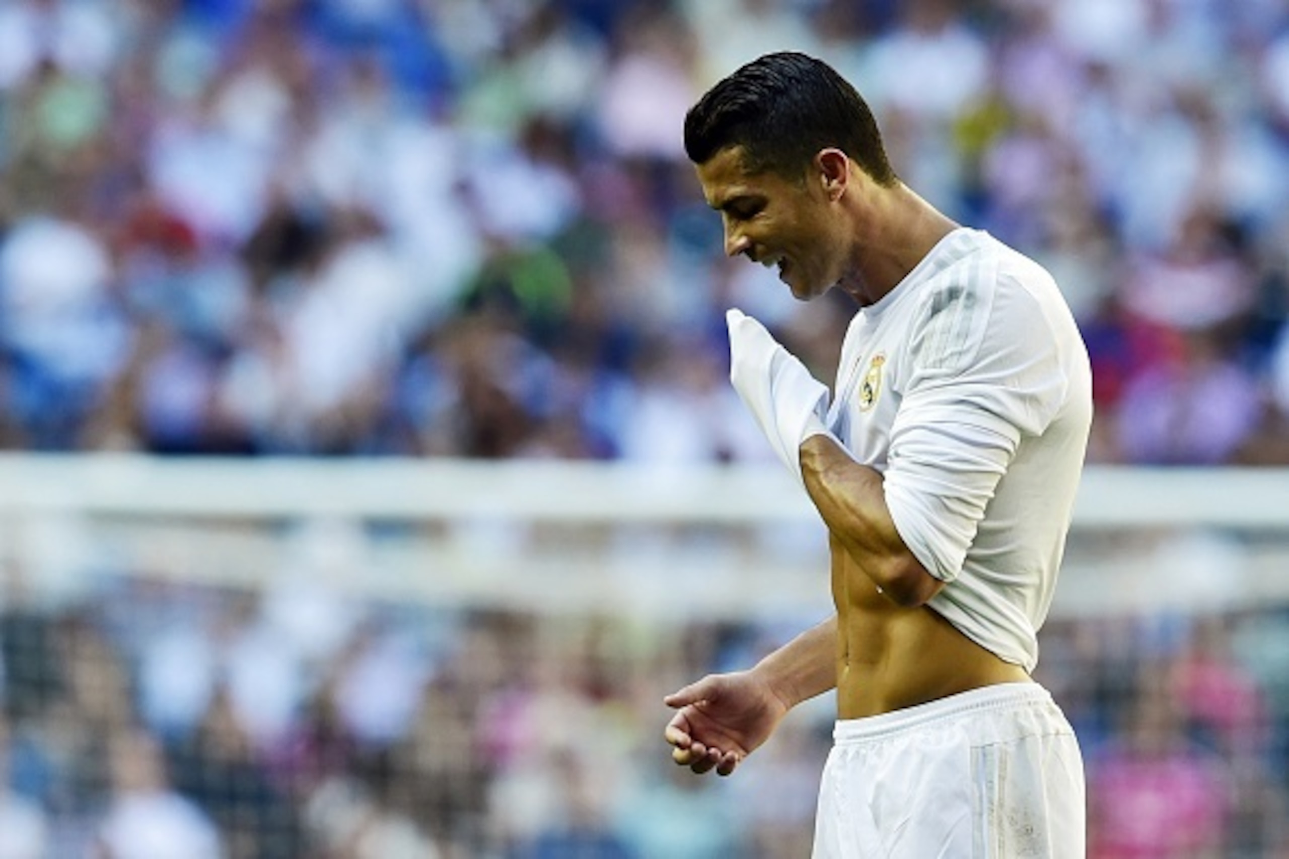 Real Madrid's Portuguese forward Cristiano Ronaldo gestures during the Spanish league football match Real Madrid CF vs Granada FC at the Santiago Bernabeu stadium in Madrid on Spetember 19, 2015. AFP PHOTO/ JAVIER SORIANO (Photo credit should rea Real Madrid's Portuguese forward Cristiano Ronaldo gestures during the Spanish league football match Real Madrid CF vs Granada FC at the Santiago Bernabeu stadium in Madrid on Spetember 19, 2015. AFP PHOTO/ JAVIER SORIANO (Photo credit should rea