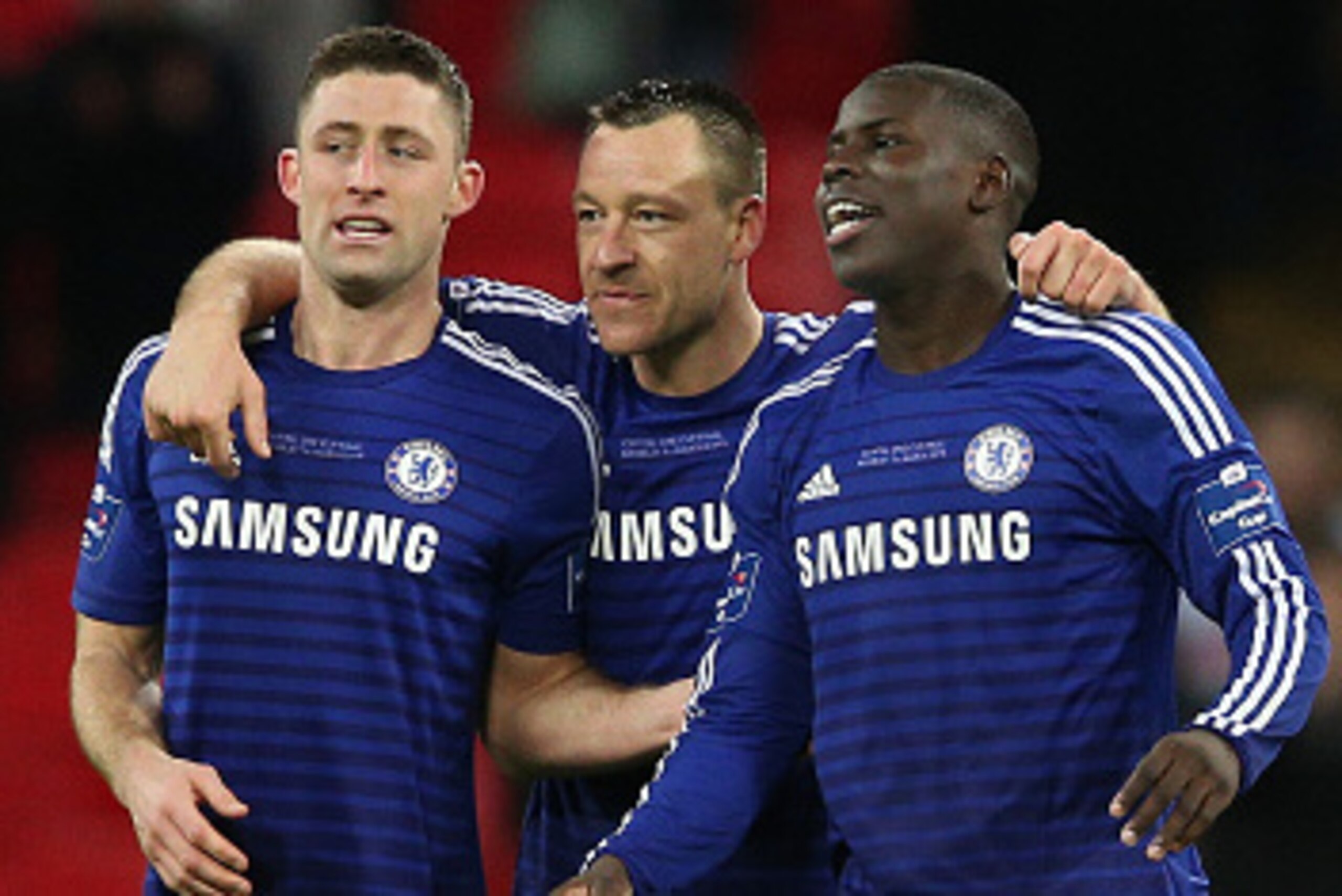 LONDON, ENGLAND - MARCH 01:  (L-R) Gary Cahill, John Terry and Kurt Zouma of Chelsea celebrate after victory in the Capital One Cup Final match between Chelsea and Tottenham Hotspur at Wembley Stadium on March 1, 2015 in London, England.  (Photo by Clive 