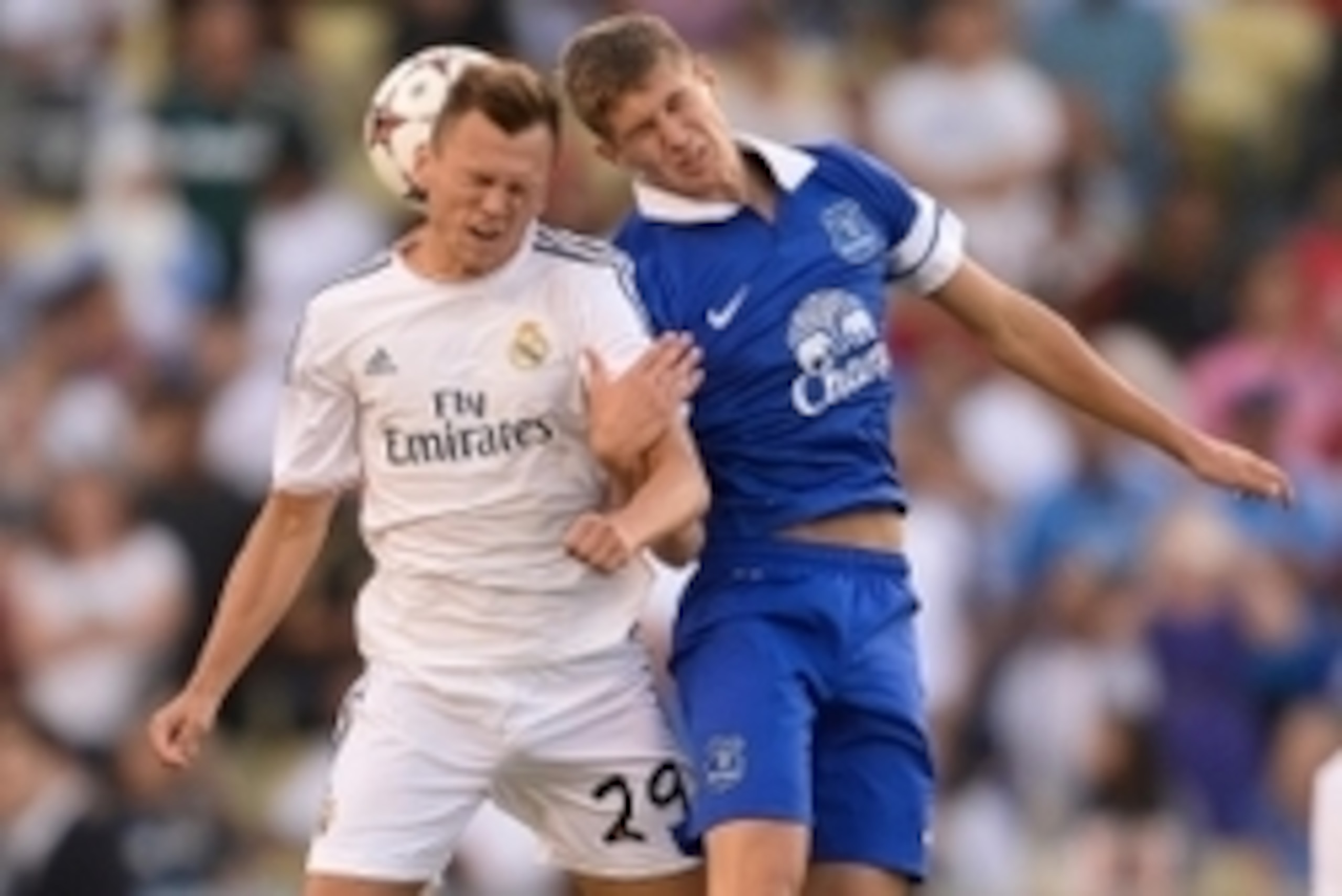 Aug 3, 2013; Los Angeles, CA, USA; Real Madrid forward Joselu (29) and Everton player John Stones (26) go up for a header in second half action of the Guiness International Champions Cup semifinals at Dodger Stadium. Mandatory Credit: Robert Hanashiro-USA Aug 3, 2013; Los Angeles, CA, USA; Real Madrid forward Joselu (29) and Everton player John Stones (26) go up for a header in second half action of the Guiness International Champions Cup semifinals at Dodger Stadium. Mandatory Credit: Robert Hanashiro-USA