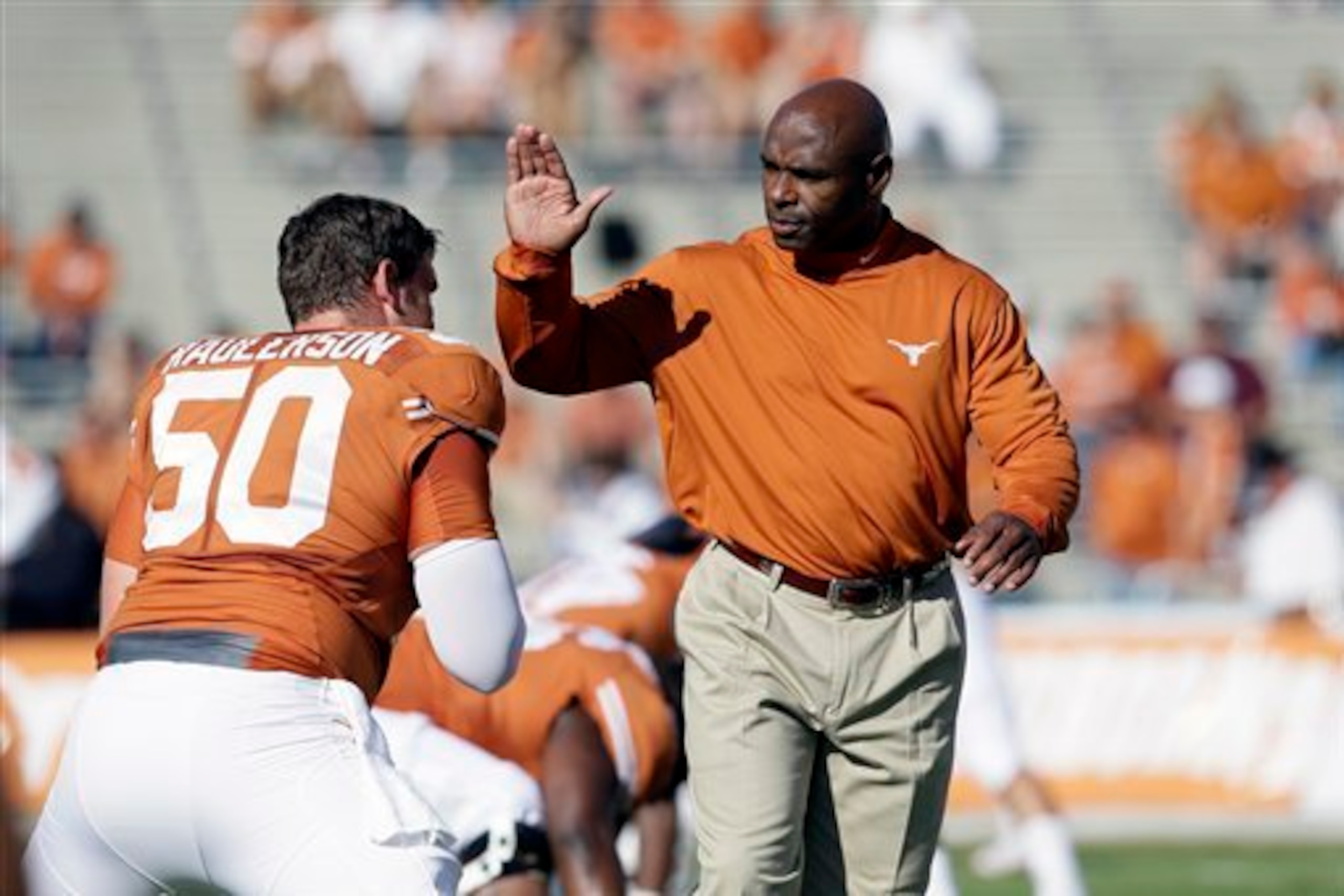 Charlie Strong is making a difference as Texas' head coach.