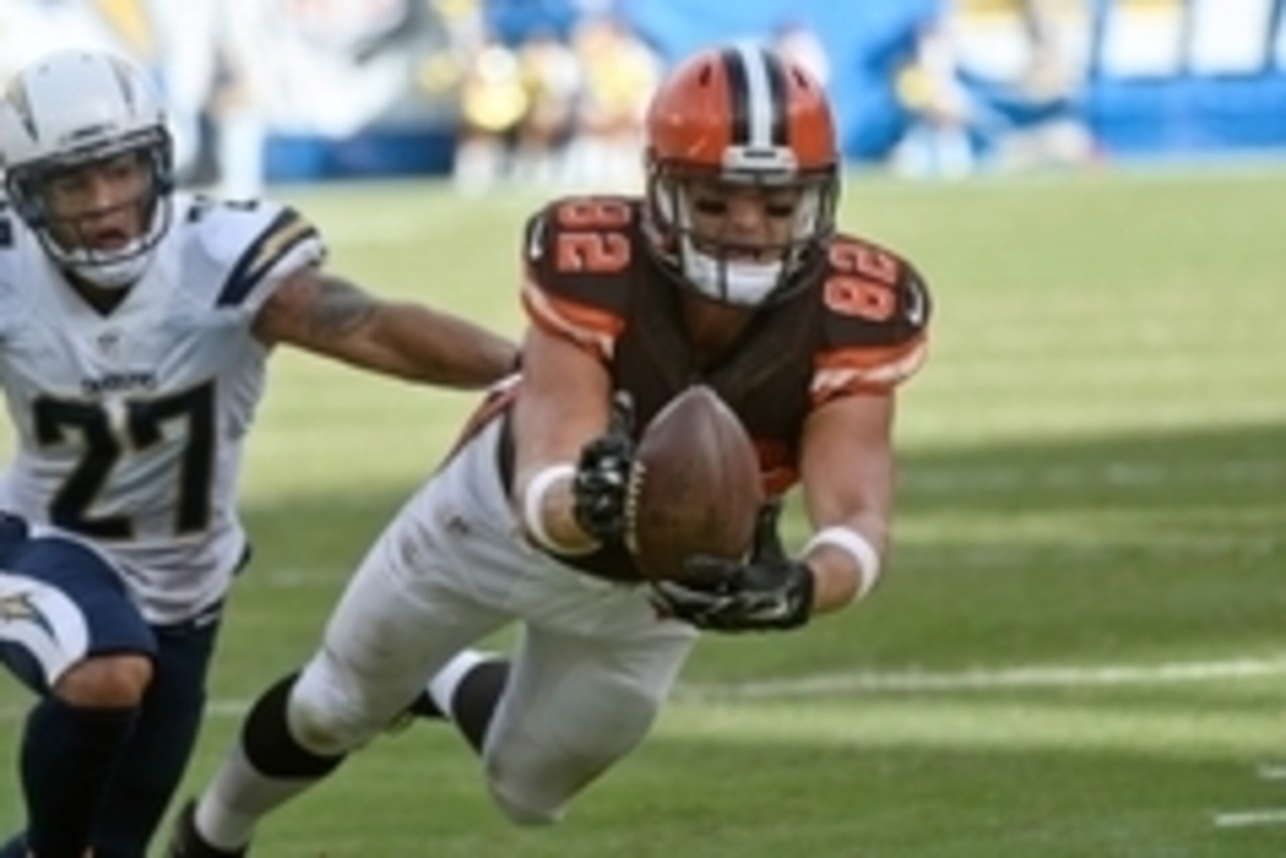 Oct 4, 2015; San Diego, CA, USA; Cleveland Browns tight end Gary Barnidge (82) juggles a pass while diving into the end zone as San Diego Chargers strong safety Jimmy Wilson (27) tries to break up the play in the fourth quarter at Qualcomm Stadium. After 