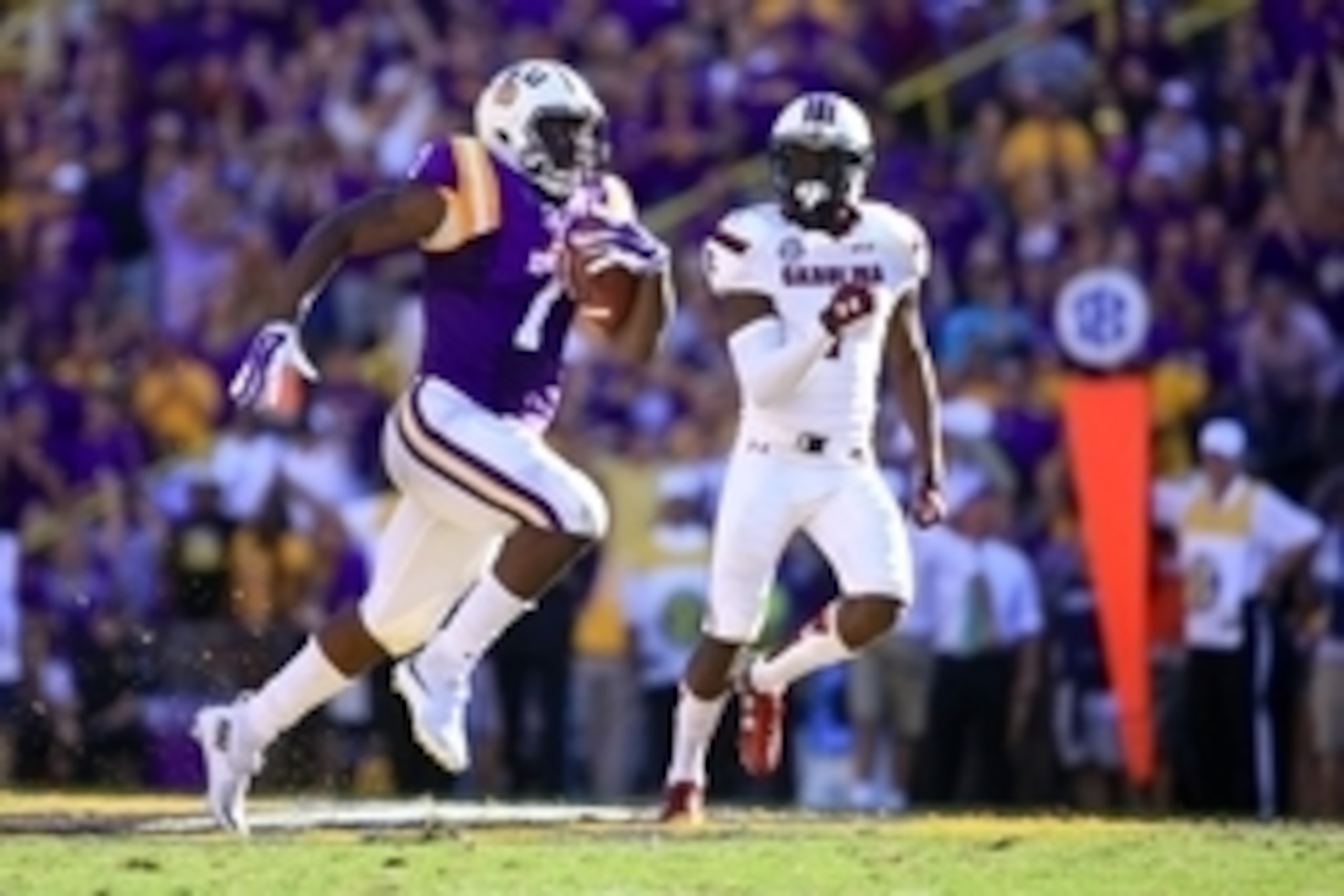Oct 10, 2015; Baton Rouge, LA, USA; LSU Tigers running back Leonard Fournette (7) runs for an 87-yard touchdown during the third quarter of a game against the South Carolina Gamecocks at Tiger Stadium.  Mandatory Credit: Derick E. Hingle-USA TODAY Sports