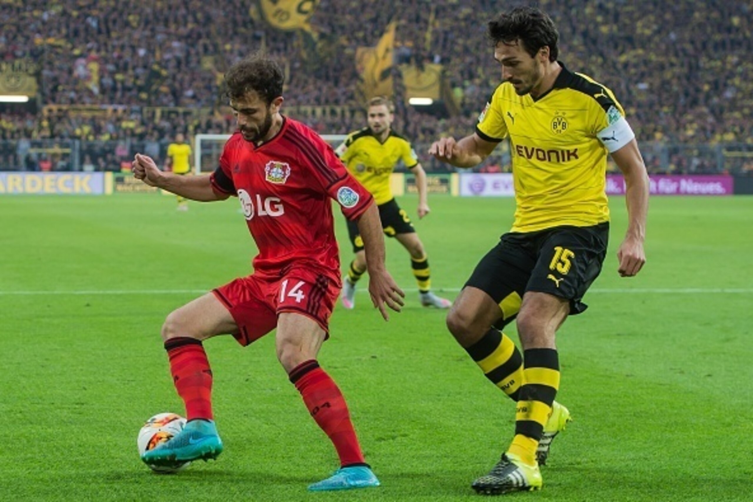 (L-R) Admir Mehmedi of Bayer 04 Leverkusen, Mats Hummels of Borussia Dortmund during the Bundesliga match between Borussia Dortmund and Bayer 04 Leverkusen on September 20, 2015 at the Signal Iduna Park in Dortmund, Germany.(Photo by VI Images via Getty I