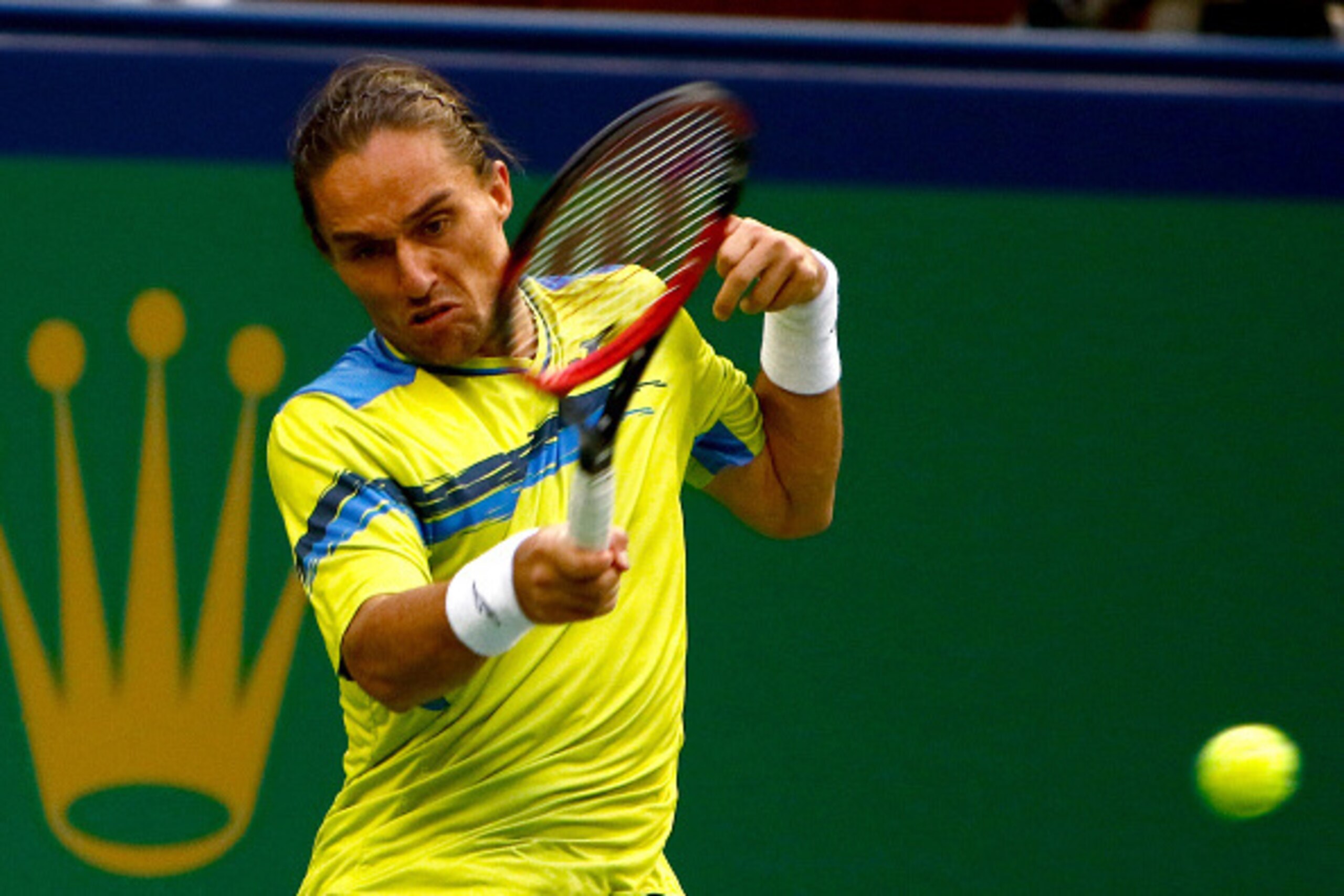 SHANGHAI, CHINA - OCTOBER 11:  Alexandr Dolgopolov of Ukraine returns a shot to Borna Coric of Croatia during their match on day 1 of Shanghai Rolex Masters 2015 at Qi Zhong Tennis Centre on October 11, 2015 in Shanghai, China.  (Photo by Kevin Lee/Getty 