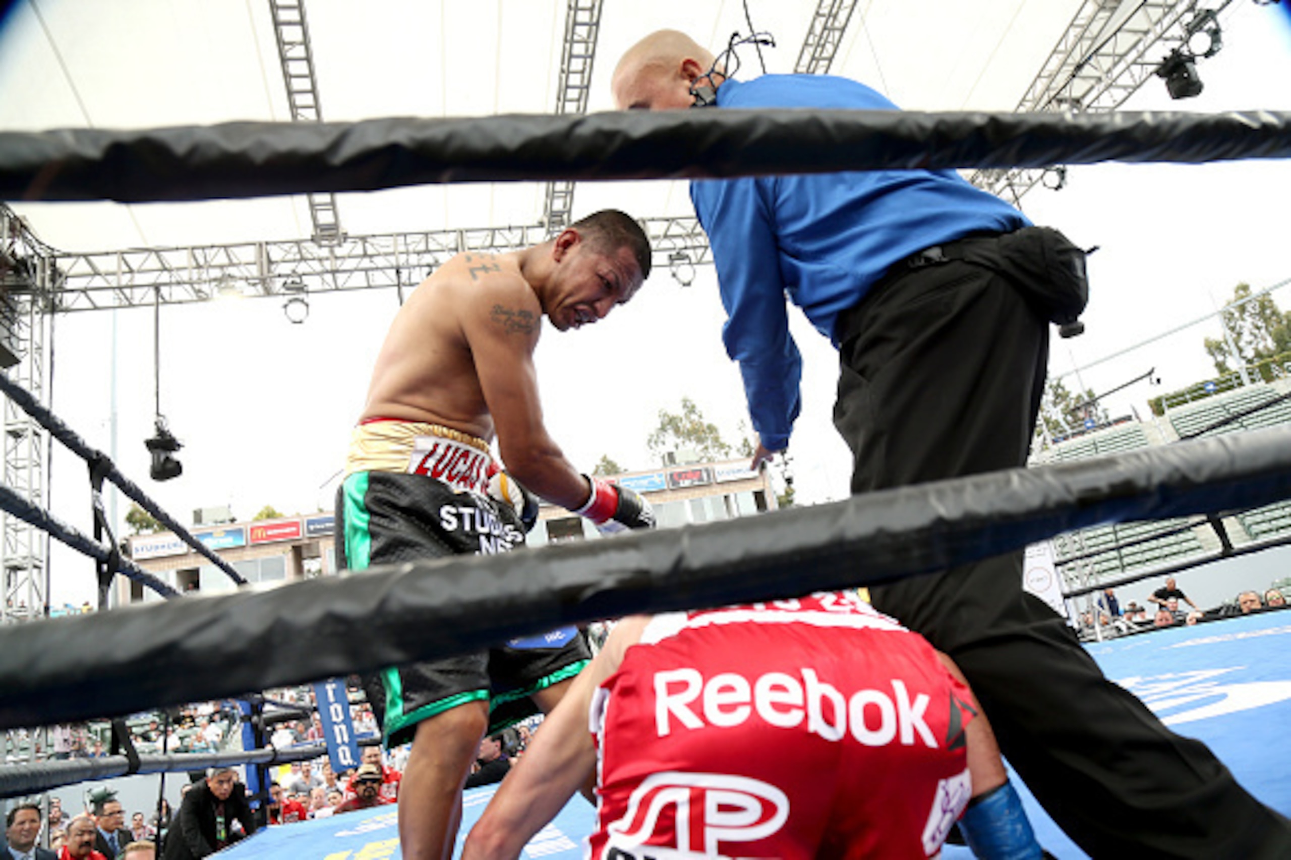 CARSON, CA - JUNE 06: Aron Martinez knocks down Robert Guerrero in the fourth round of their welterweight bout at StubHub Center on June 6, 2015 in Carson, California. Guerrero won in a split decision.  (Photo by Stephen Dunn/Getty Images)
