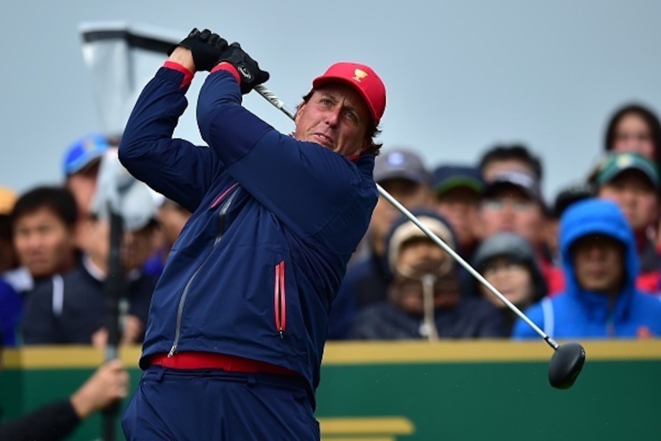 Phil Mickelson of the US tees off on the 2nd hole during the final round singles matches of the 2015 Presidents Cup at the Jack Nicklaus Golf Club in Incheon, west of Seoul, on October 11, 2015.     AFP PHOTO / JUNG YEON-JERESTRICTED TO EDITORIAL USE - ST