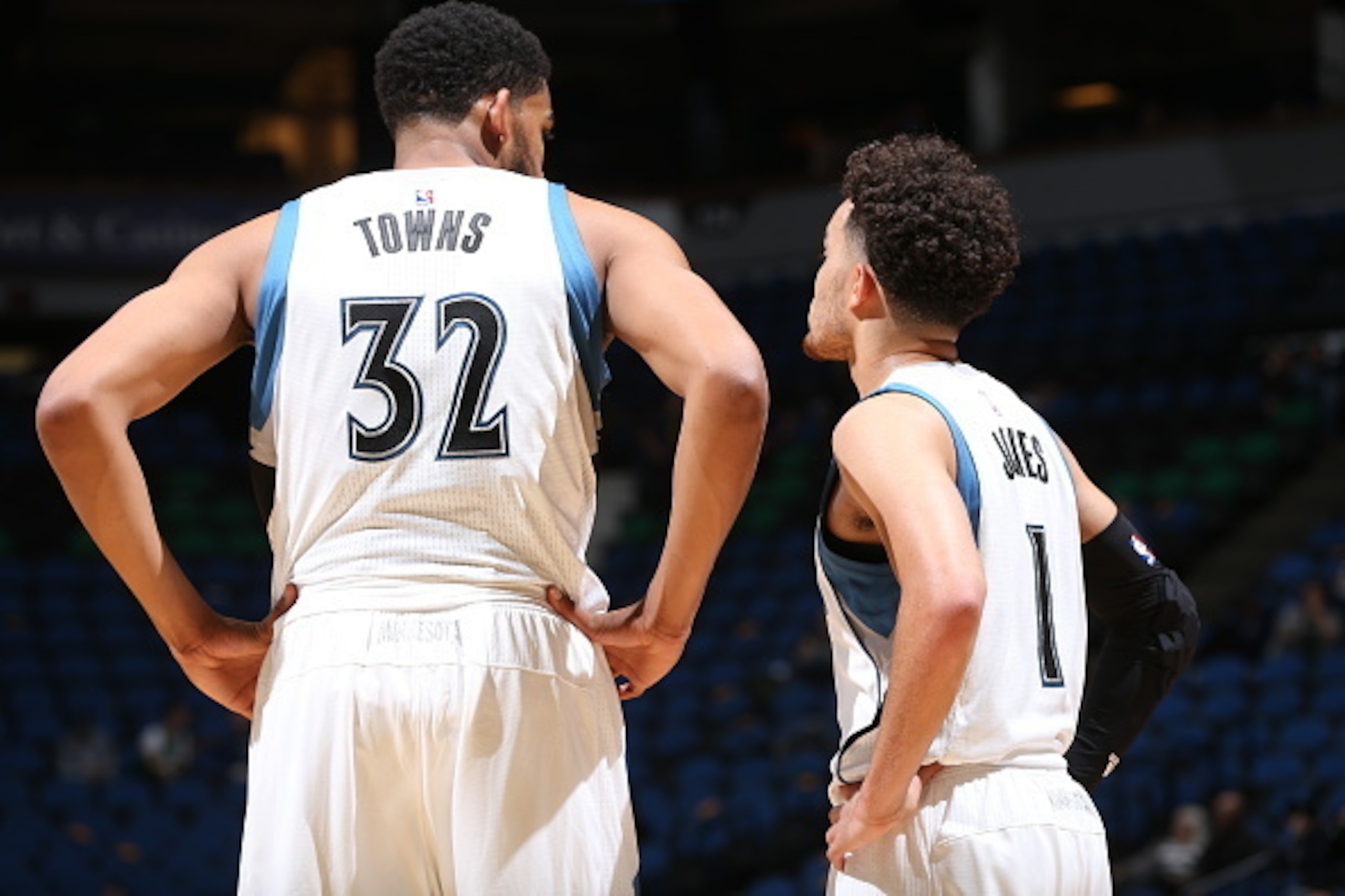 MINNEAPOLIS, MN - OCTOBER 7: Karl-Anthony Towns #32  and Tyus Jones #1 of the Minnesota Timberwolves  during a preseason game against the Oklahoma City Thunder on October 7, 2015 at Target Center in Minneapolis, Minnesota. NOTE TO USER: User expressly ack