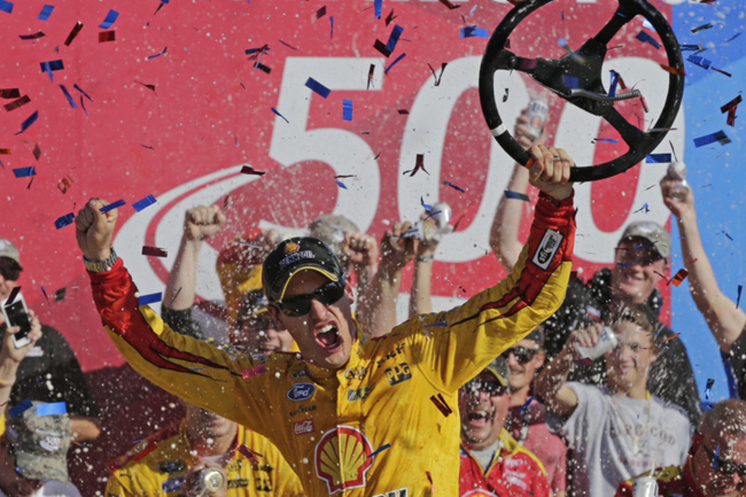 The goofy Joey Logano wheel-shaking is a familiar scene in NASCAR Victory Lanes.