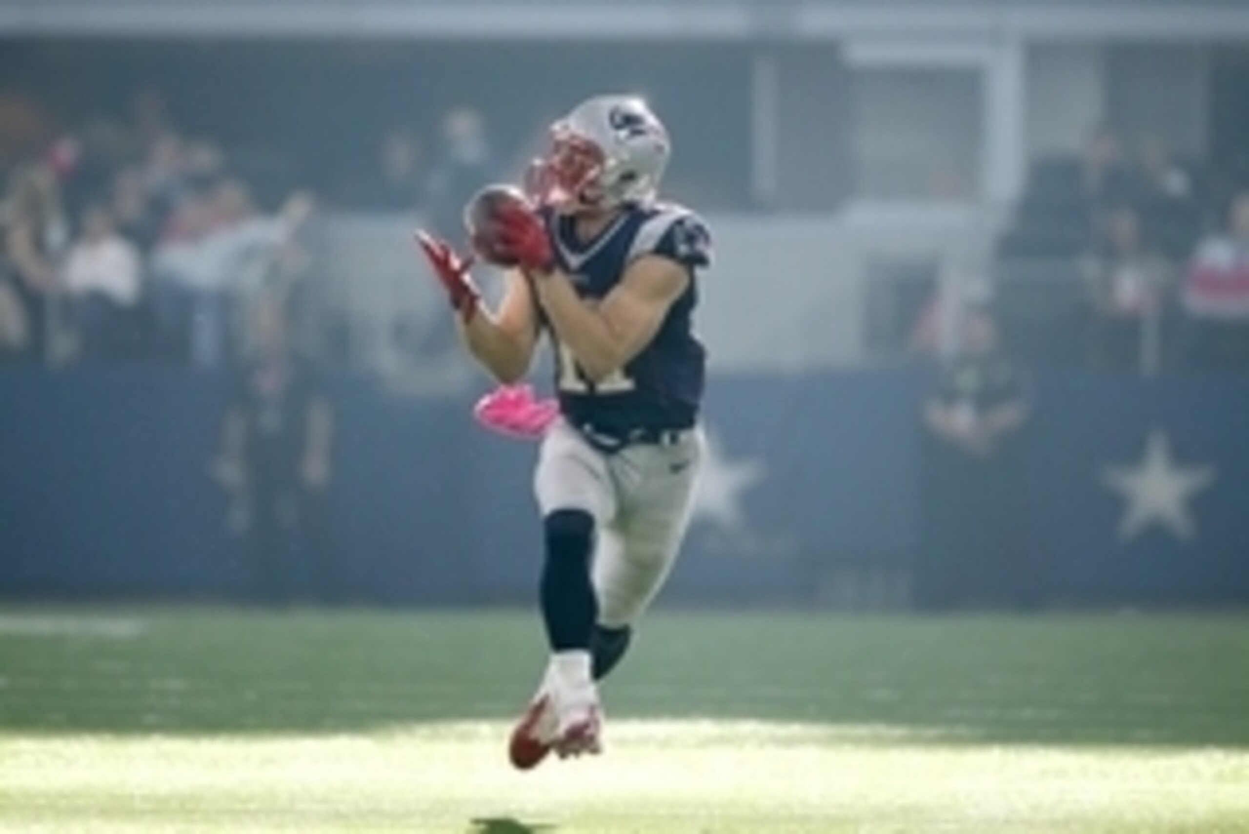 Oct 11, 2015; Arlington, TX, USA; New England Patriots wide receiver Julian Edelman (11) catches a touchdown pass against the Dallas Cowboys at AT&T Stadium. Mandatory Credit: Erich Schlegel-USA TODAY Sports