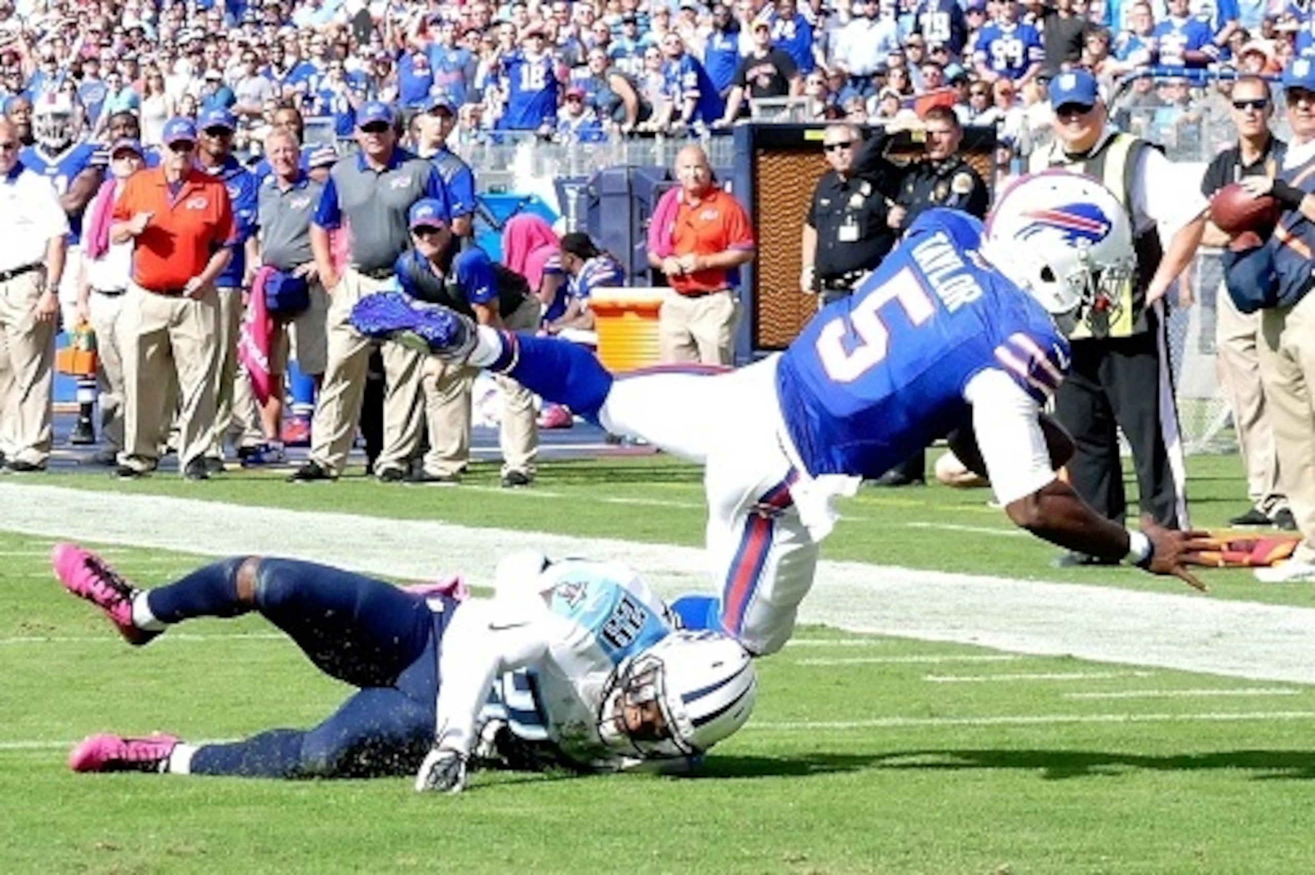 NASHVILLE, TN - OCTOBER 11: Quarterback Tyrod Taylor #5 of the Buffalo Bills dives for additional yardage against Perrish Cox #29 of the Tennessee Titans during the second half of a game at Nissan Stadium on October 11, 2015 in Nashville, Tennessee. (Phot NASHVILLE, TN - OCTOBER 11: Quarterback Tyrod Taylor #5 of the Buffalo Bills dives for additional yardage against Perrish Cox #29 of the Tennessee Titans during the second half of a game at Nissan Stadium on October 11, 2015 in Nashville, Tennessee. (Phot