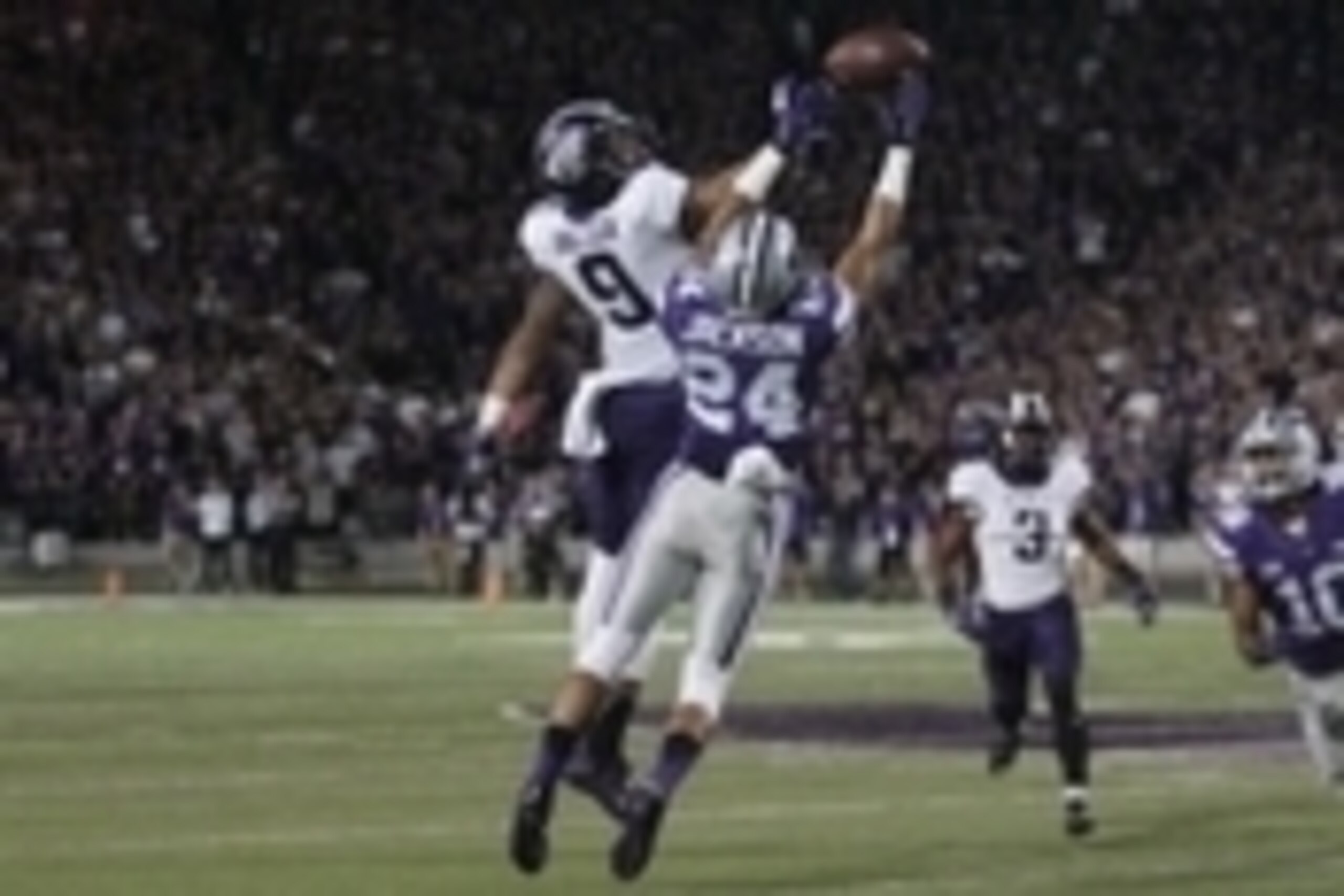 Oct 10, 2015; Manhattan, KS, USA; Kansas State Wildcats defensive back Nate Jackson (24) breaks up a pass intended by TCU Horned Frogs wide receiver Josh Doctson (9) during the Wildcats' 52-45 loss at Bill Snyder Family Football Stadium. Mandatory Credit: