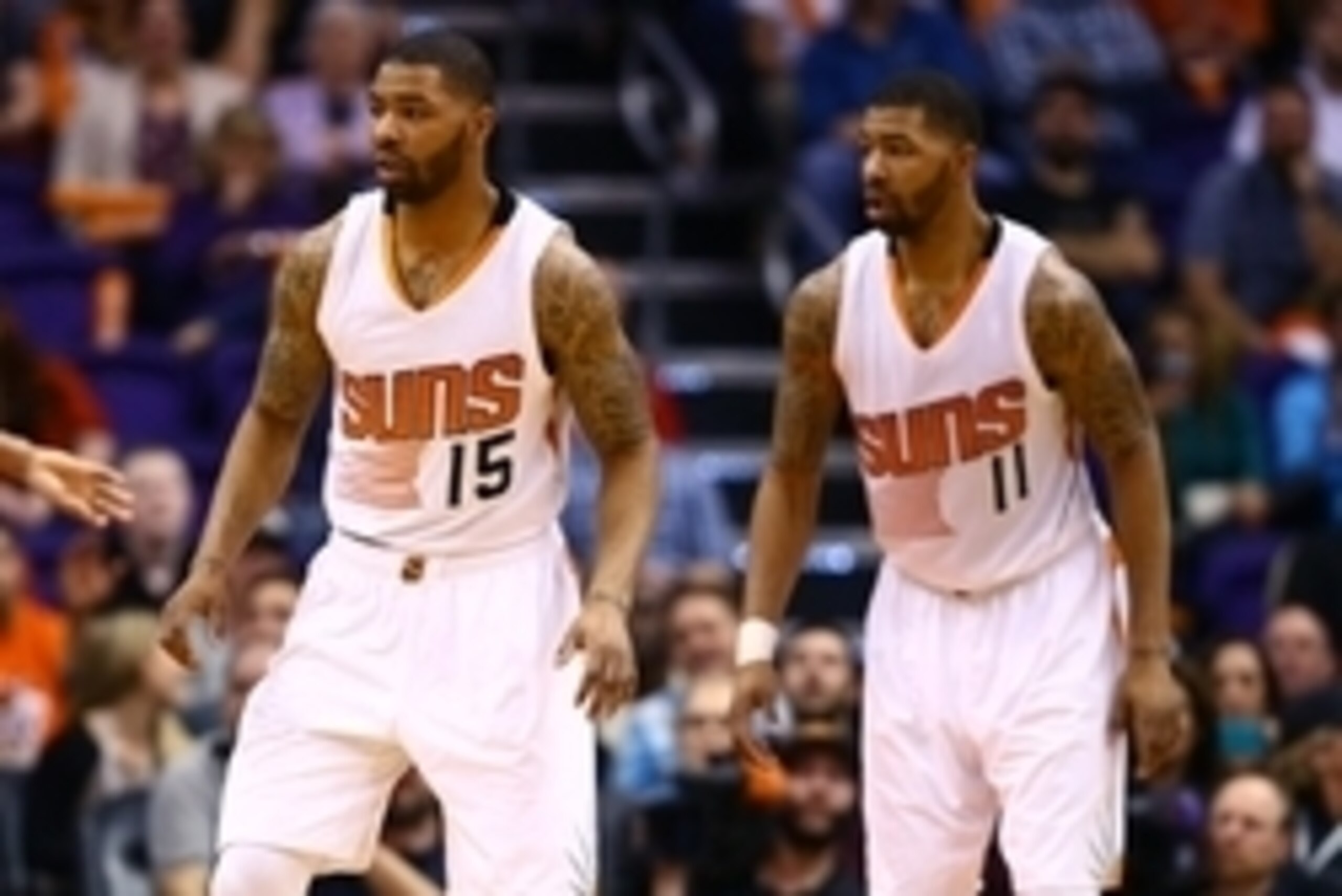 Jan 28, 2015; Phoenix, AZ, USA; Phoenix Suns forward Marcus Morris (15) and twin brother Markieff Morris (11) against the Washington Wizards at US Airways Center. The Suns defeated the Wizards 106-98. Mandatory Credit: Mark J. Rebilas-USA TODAY Sports