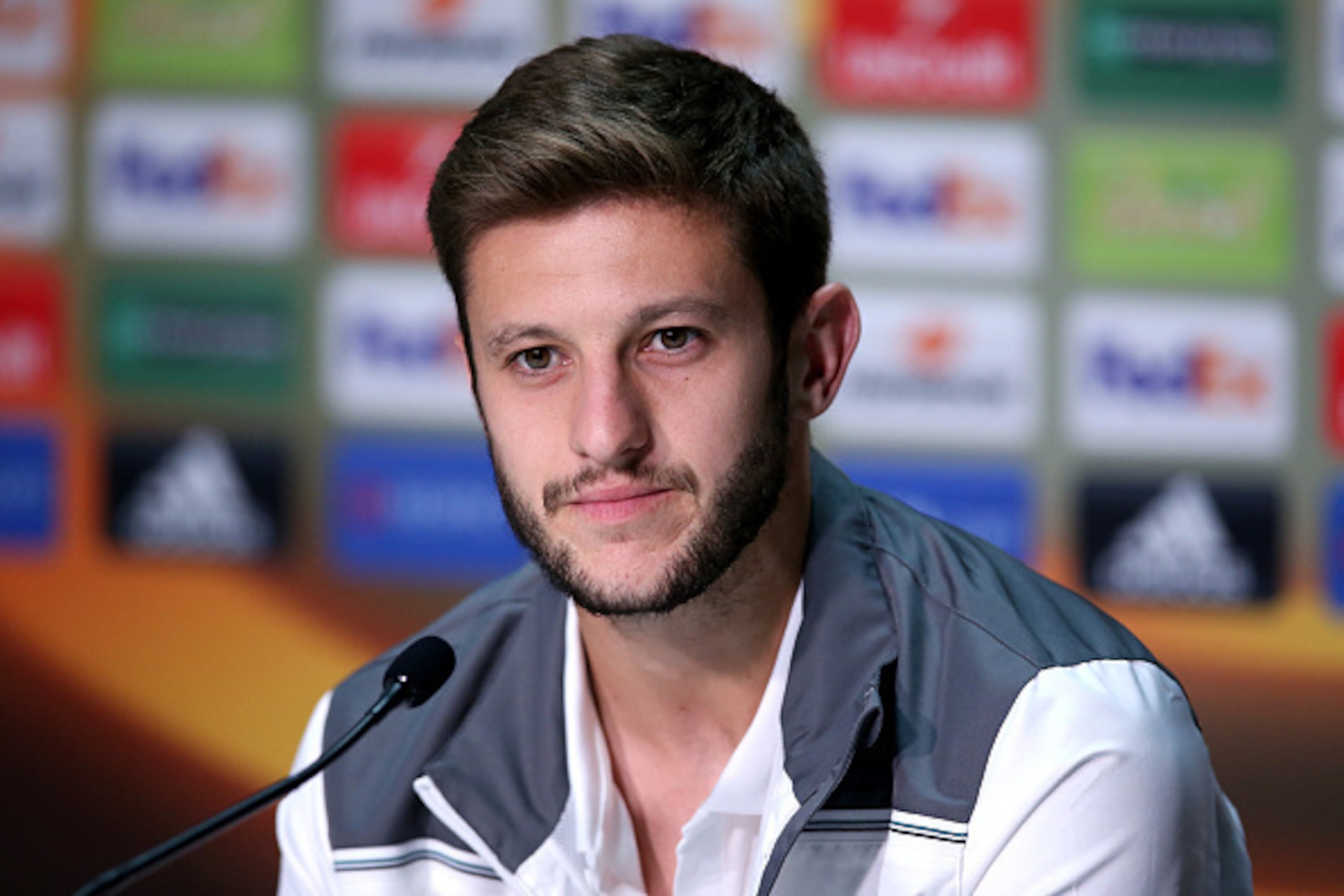 BORDEAUX, FRANCE - SEPTEMBER 16: Adam Lallana during the press conference of Liverpool FC at the Matmut Stadium ahead their Europa League game against FC Girondins de Bordeaux on September 16, 2015 in Bordeaux, France.  (Photo by Romain Perrocheau/Getty I