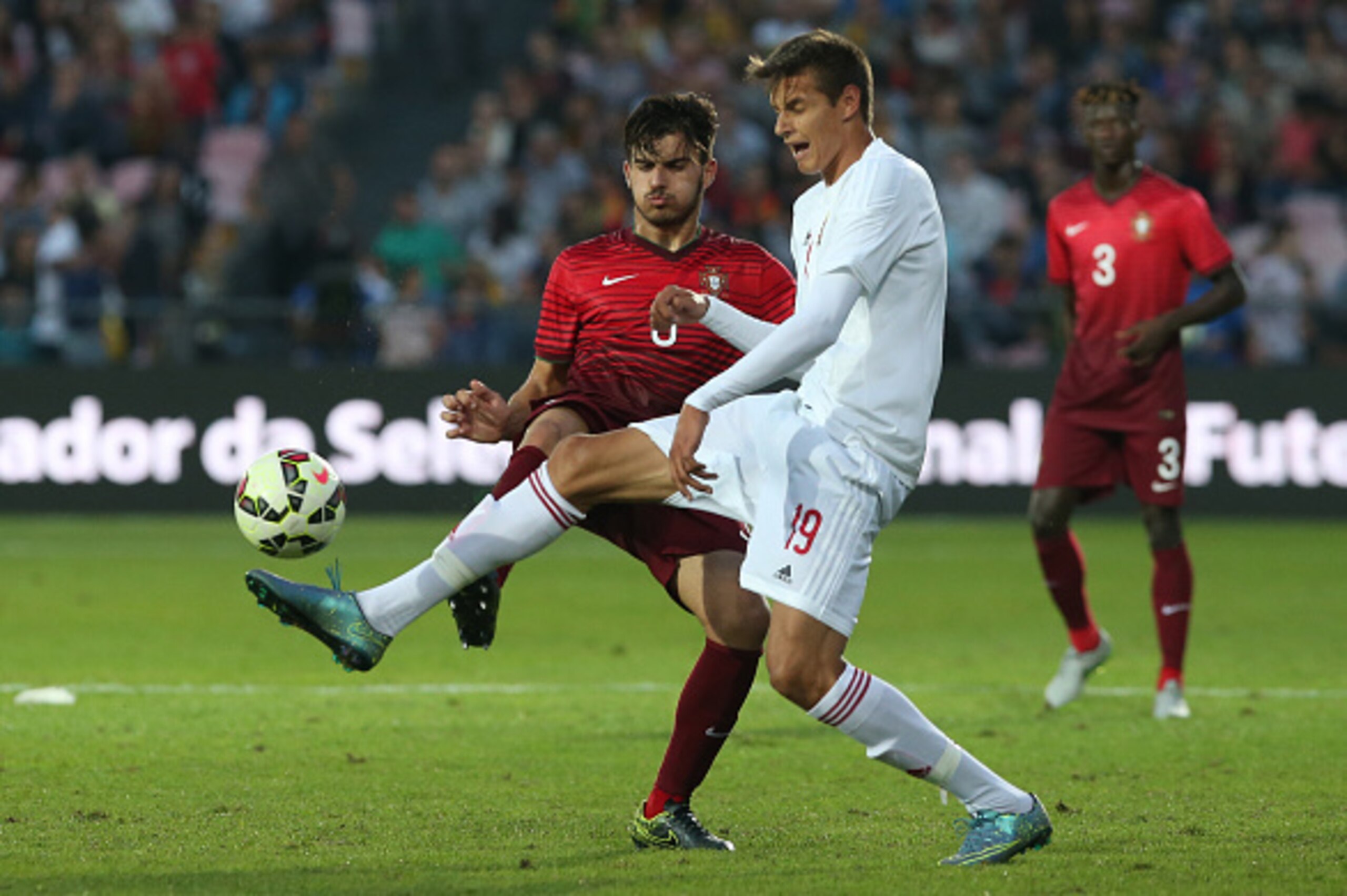 PENAFIEL, PORTUGAL - OCTOBER 9:  Portugal's midfielder Ruben Neves with Hungary's forward Norbert Balogh in action during the UEFA European Under 21 Championship Qualifier match between Portugal and Hungary at Estadio 25 de Abril on October 9, 2015 in Pen