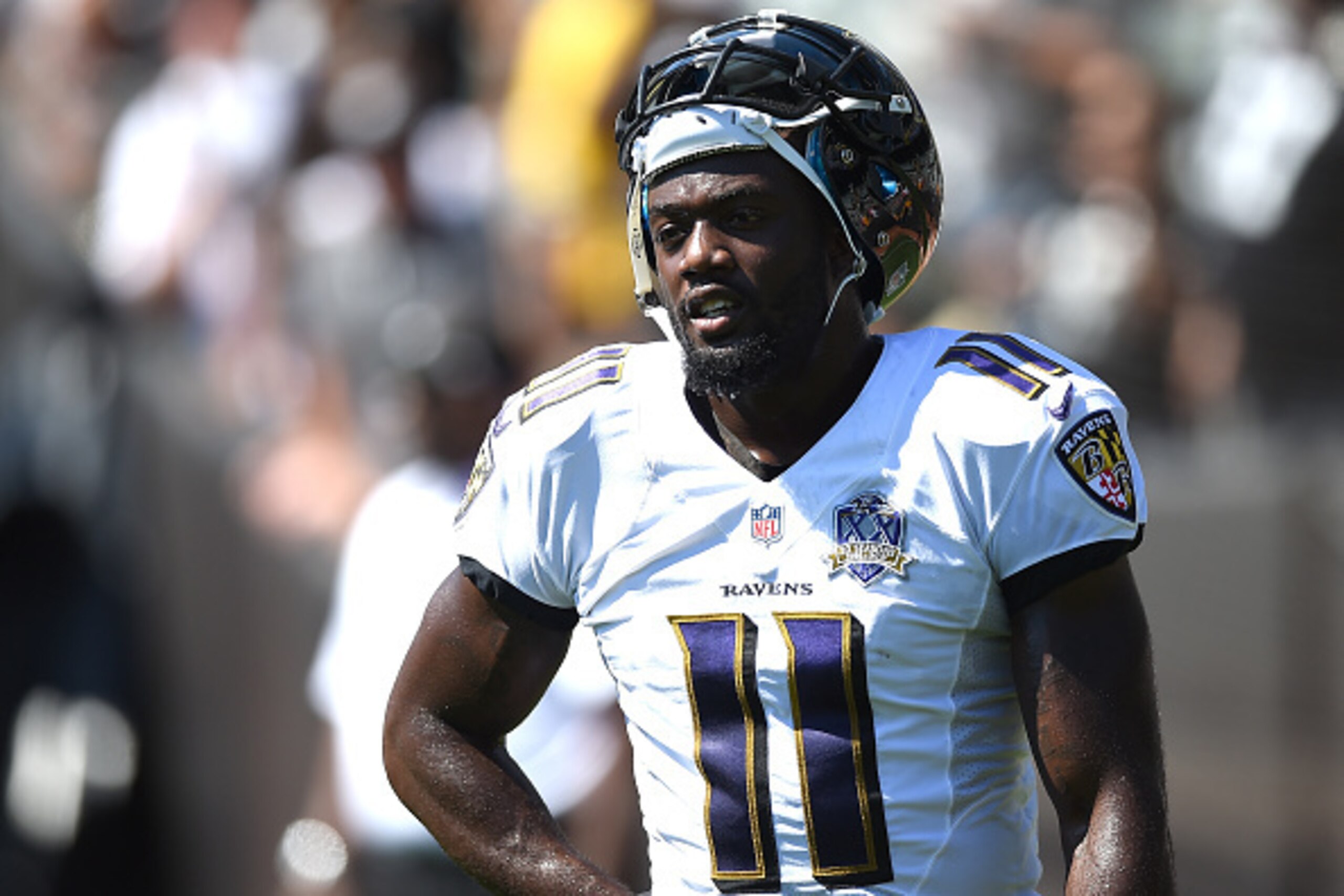 OAKLAND, CA - SEPTEMBER 20:  Kamar Aiken #11 of the Baltimore Ravens looks on during pregame prior to playing the Oakland Raiders at the O.co Coliseum on September 20, 2015 in Oakland, California.  (Photo by Thearon W. Henderson/Getty Images)