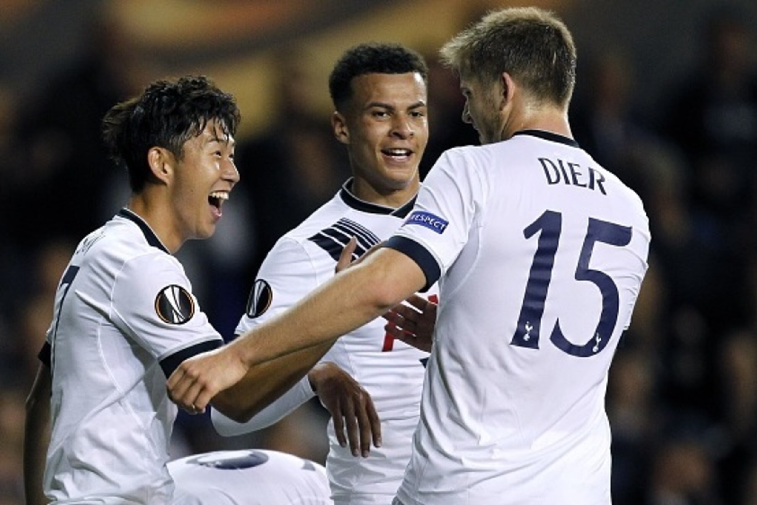 Tottenham Hotspur's South Korean striker Son Heung-Min (L) celebrates with Tottenham Hotspur's English defender Eric Dier (R) and Tottenham Hotspur's English midfielder Dele Alli (C) after scoring his second goal  during the UEFA Europa League Group J foo