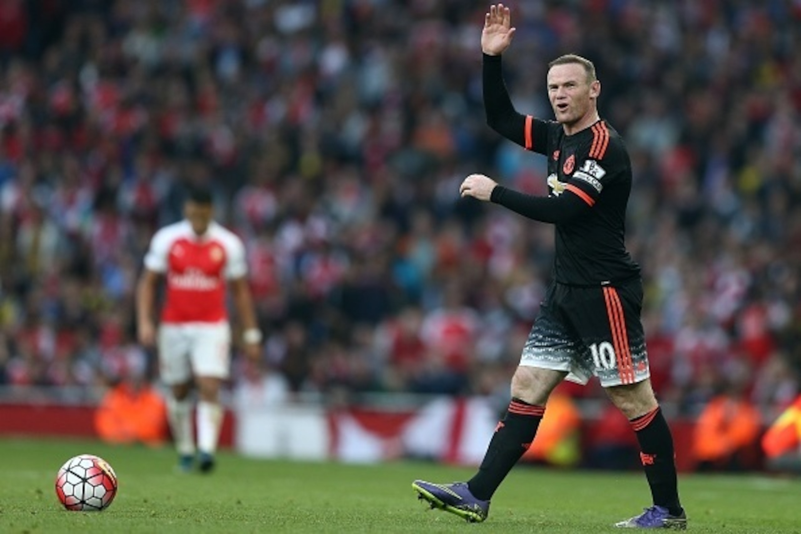 Manchester United's English striker Wayne Rooney reacts in frustration during the English Premier League football match between Arsenal and Manchester United at the Emirates Stadium in London on October 4, 2015.    AFP PHOTO / JUSTIN TALLIS

RESTRICTED TO