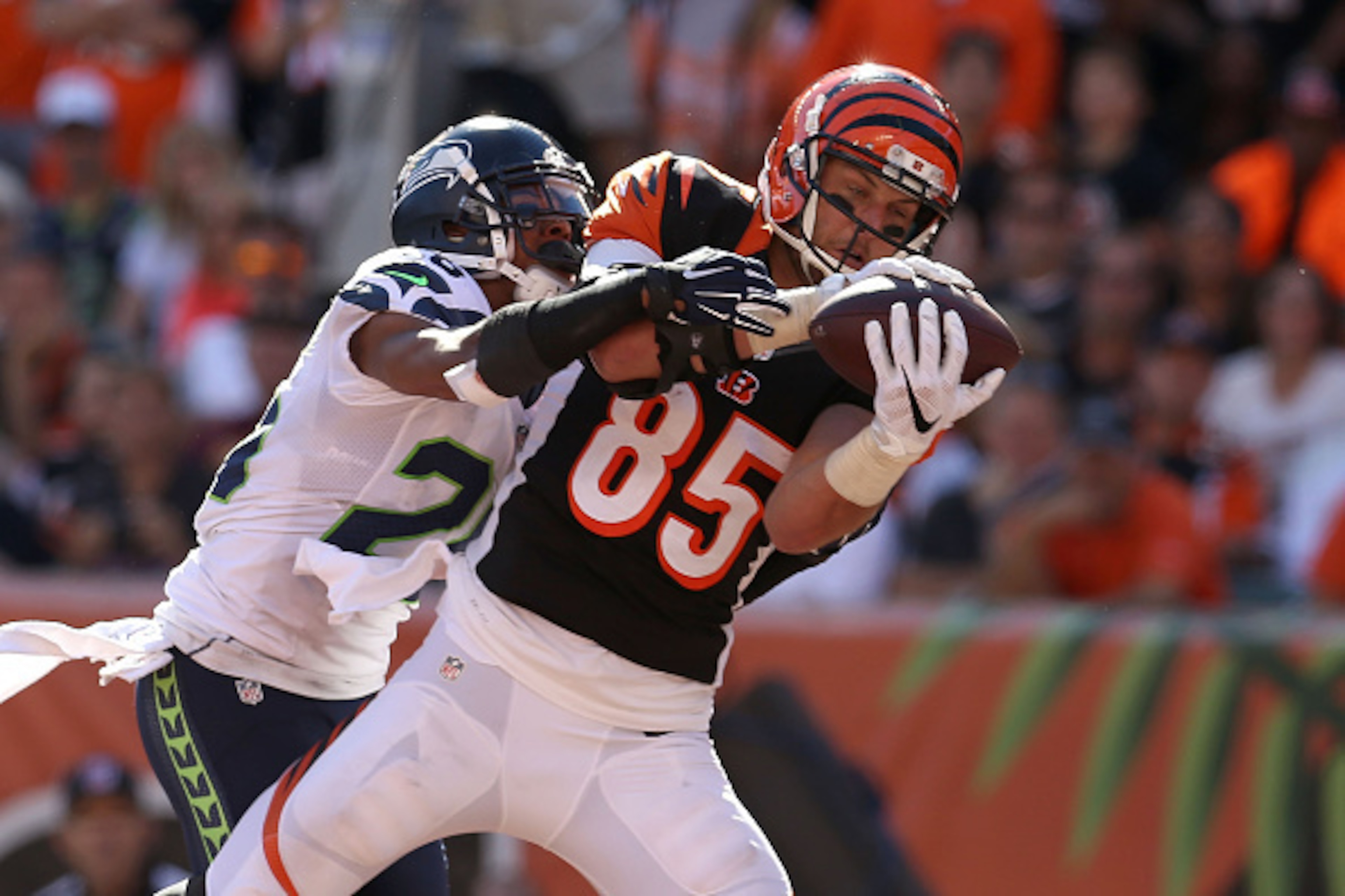 CINCINNATI, OH - OCTOBER 11: Tyler Eifert #85 of the Cincinnati Bengals catches a pass for his second touchdown of the game while being defended by Cary Williams #26 of the Seattle Seahawks during the fourth quarter at Paul Brown Stadium on October 11, 20 CINCINNATI, OH - OCTOBER 11: Tyler Eifert #85 of the Cincinnati Bengals catches a pass for his second touchdown of the game while being defended by Cary Williams #26 of the Seattle Seahawks during the fourth quarter at Paul Brown Stadium on October 11, 20