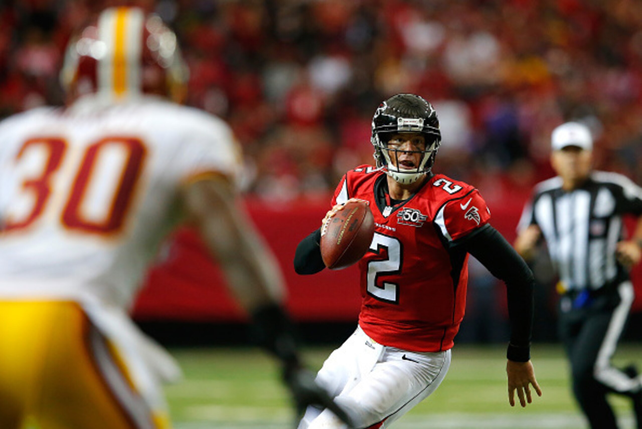 ATLANTA, GA - OCTOBER 11:  Matt Ryan #2 of the Atlanta Falcons rushes out of the pocket against the Washington Redskins at Georgia Dome on October 11, 2015 in Atlanta, Georgia.  (Photo by Kevin C. Cox/Getty Images)