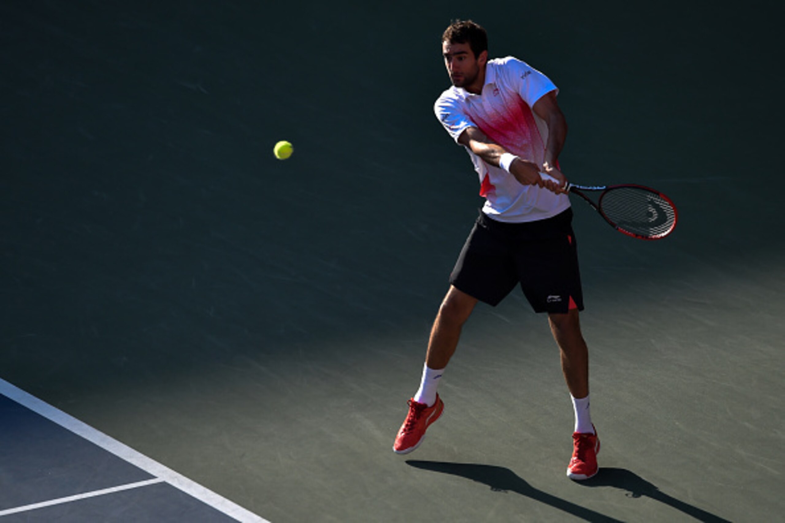 TOKYO, JAPAN - OCTOBER 09:  Marin Cilic of Croatia in action during the men's singles quater final match against Kei Nishikori  of Japan on day five of Rakuten Open 2015 at Ariake Colosseum on October 9, 2015 in Tokyo, Japan.  (Photo by Koki Nagahama/Gett