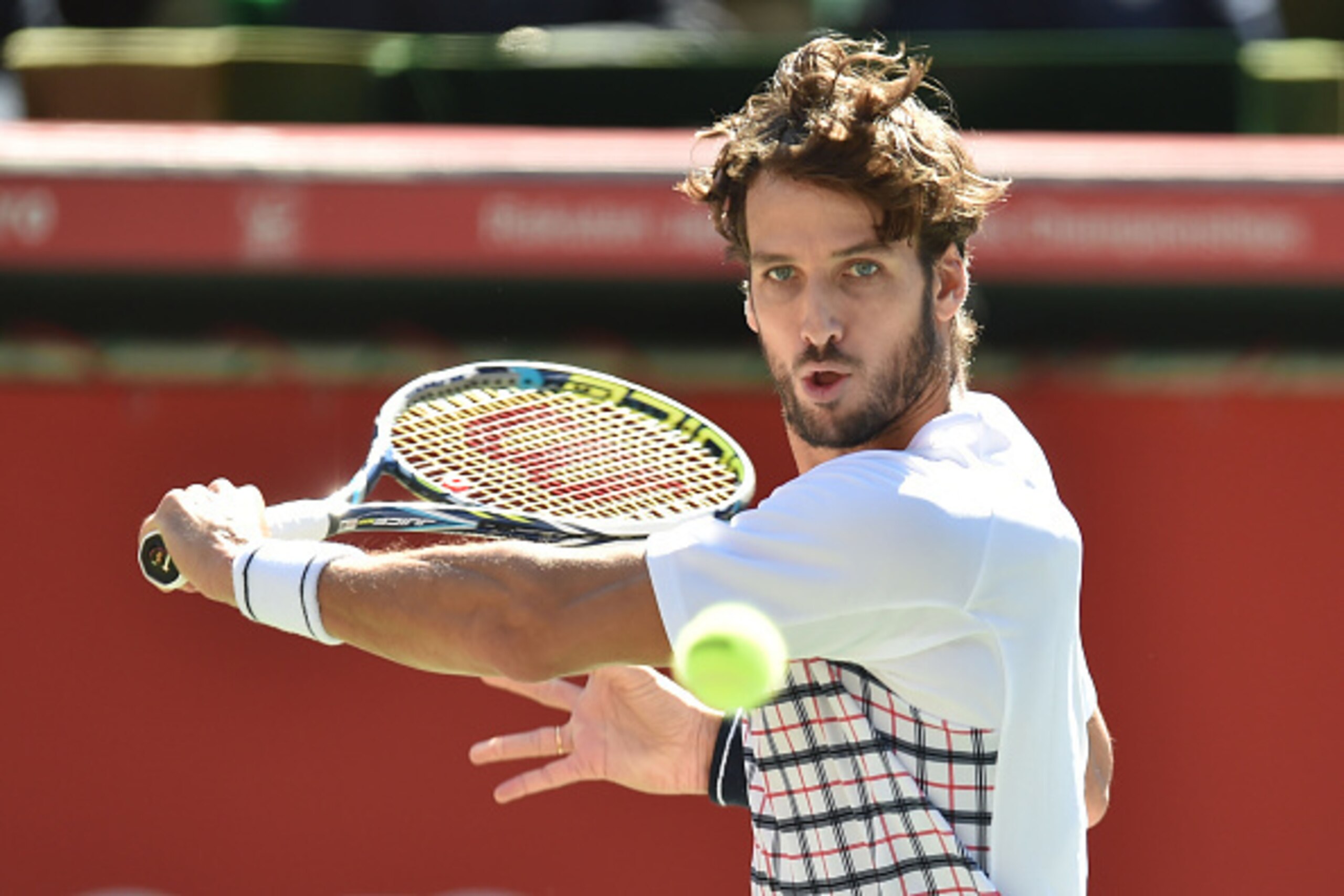 TOKYO, JAPAN - OCTOBER 07:  Feliciano Lopez of Spain competes against Joao Sousa of Portugal during the men's singles first round match on day three of Rakuten Open 2015 at Ariake Colosseum on October 7, 2015 in Tokyo, Japan.  (Photo by Atsushi Tomura/Get