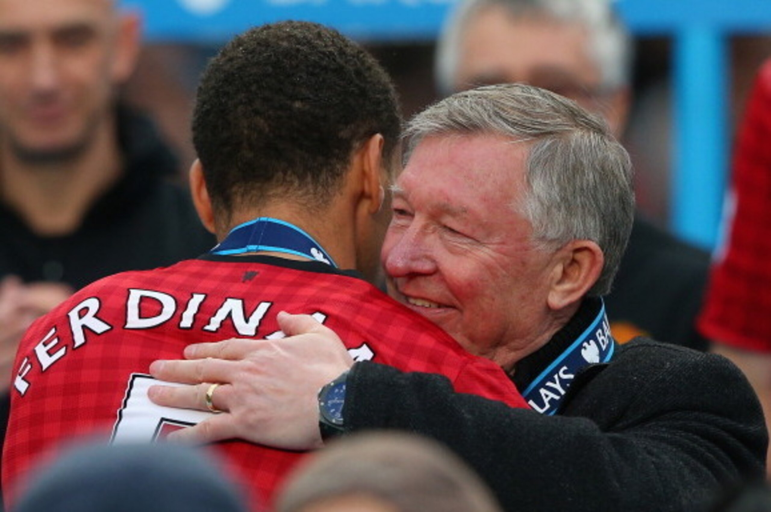 MANCHESTER, ENGLAND - MAY 12:  Manchester United Manager Sir Alex Ferguson embraces Rio Ferdinand following the Barclays Premier League match between Manchester United and Swansea City at Old Trafford on May 12, 2013 in Manchester, England.  (Photo by Ale