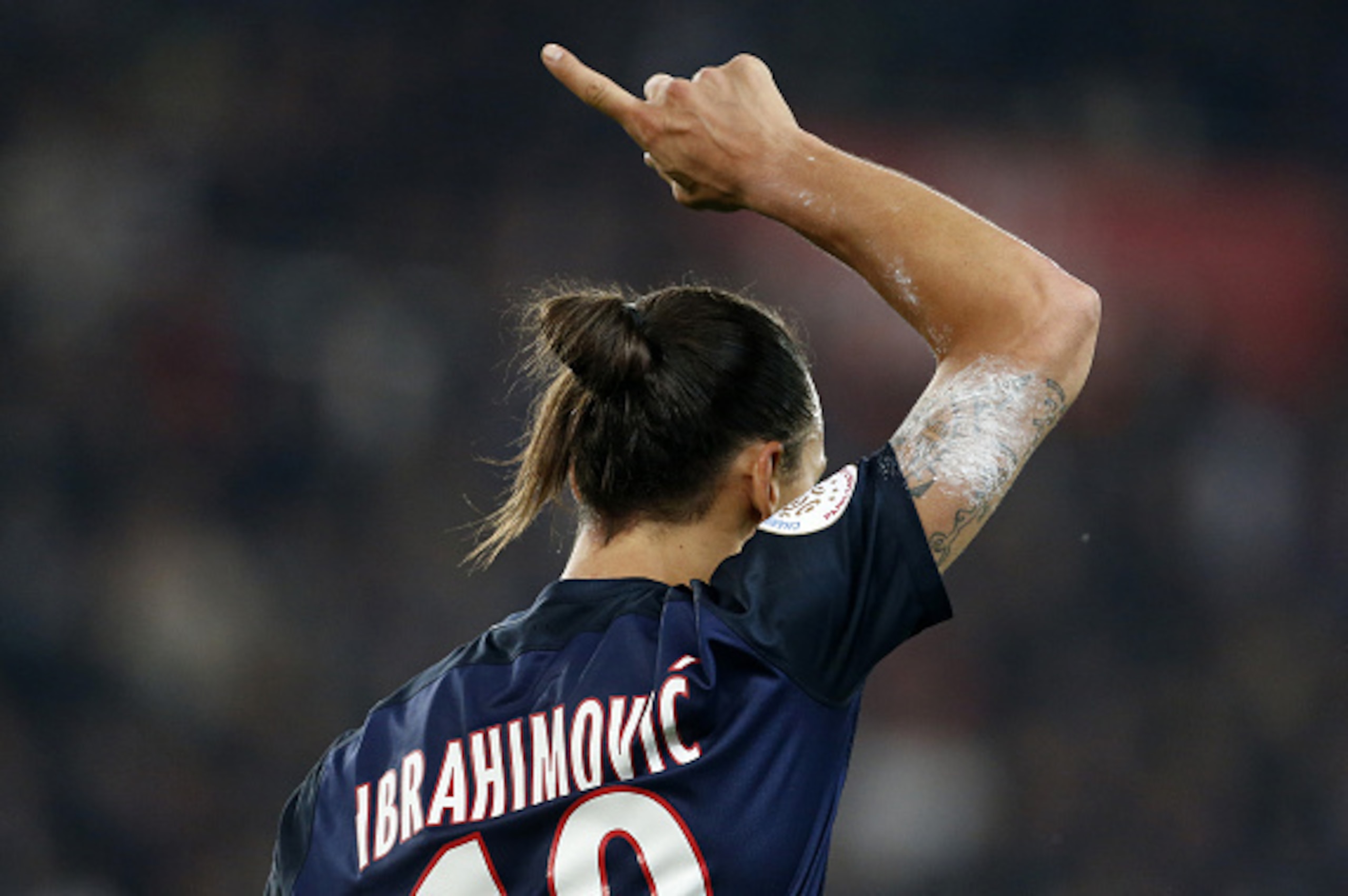 PARIS, FRANCE - OCTOBER 4: Zlatan Ibrahimovic of PSG celebrates scoring a goal during the French Ligue 1 match between Paris Saint-Germain FC (PSG) and Olympique de Marseille at Parc des Princes stadium on October 4, 2015 in Paris, France. (Photo by Jean 