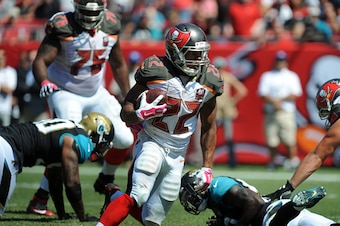TAMPA, FL - OCTOBER 11: Running back Doug Martin #22 of the Tampa Bay Buccaneers runs with the ball in the second quarter against the Jacksonville Jaguars at Raymond James Stadium on October 11, 2015 in Tampa, Florida. (Photo by Cliff McBride/Getty Images