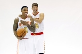 Sep 28, 2015; Atlanta, GA, USA; Atlanta Hawks guard Jeff Teague (0) and guard Kyle Korver (26) reacts during media day at Philips Arena. Mandatory Credit: Brett Davis-USA TODAY Sports