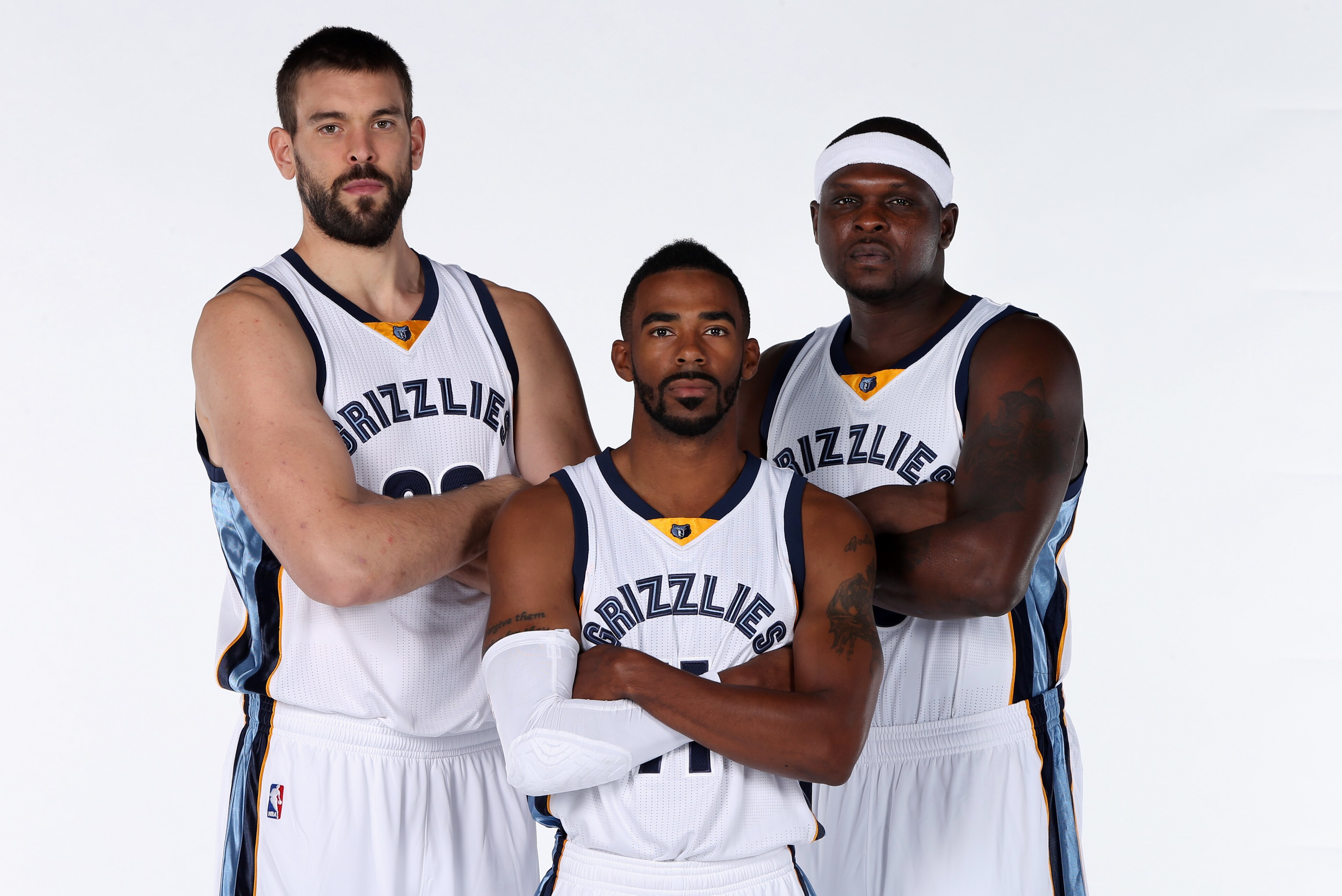 MEMPHIS, TN - SEPTEMBER 29: Marc Gasol #33, Mike Conley #11 and Zach Randolph #50 of the Memphis Grizzlies poses for a portrait during Memphis Grizzlies Media Day on September 29, 2014 at FedExForum in Memphis, Tennessee.  NOTE TO USER: User expressly ack