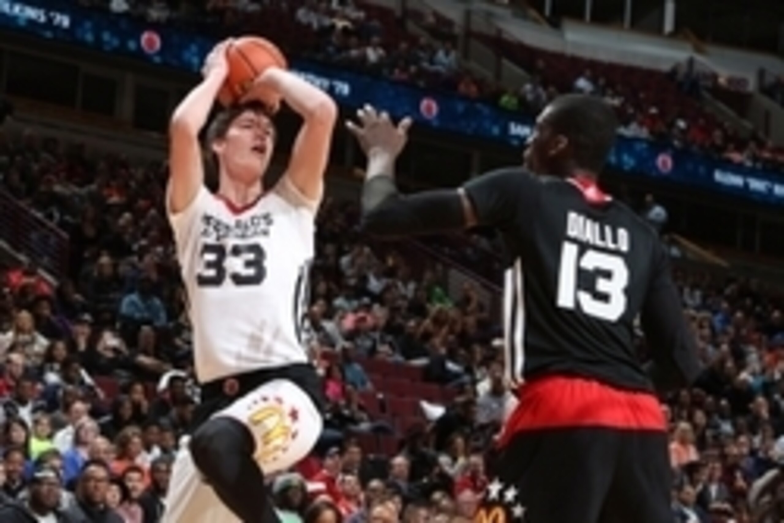 Apr 1, 2015; Chicago, IL, USA;  McDonalds High School All American West boys center Stephen Zimmerman Jr. (33) takes a shot against East center Cheick Diallo (13) during the McDonalds High School All American Games at the United Center. Mandatory Credit: 