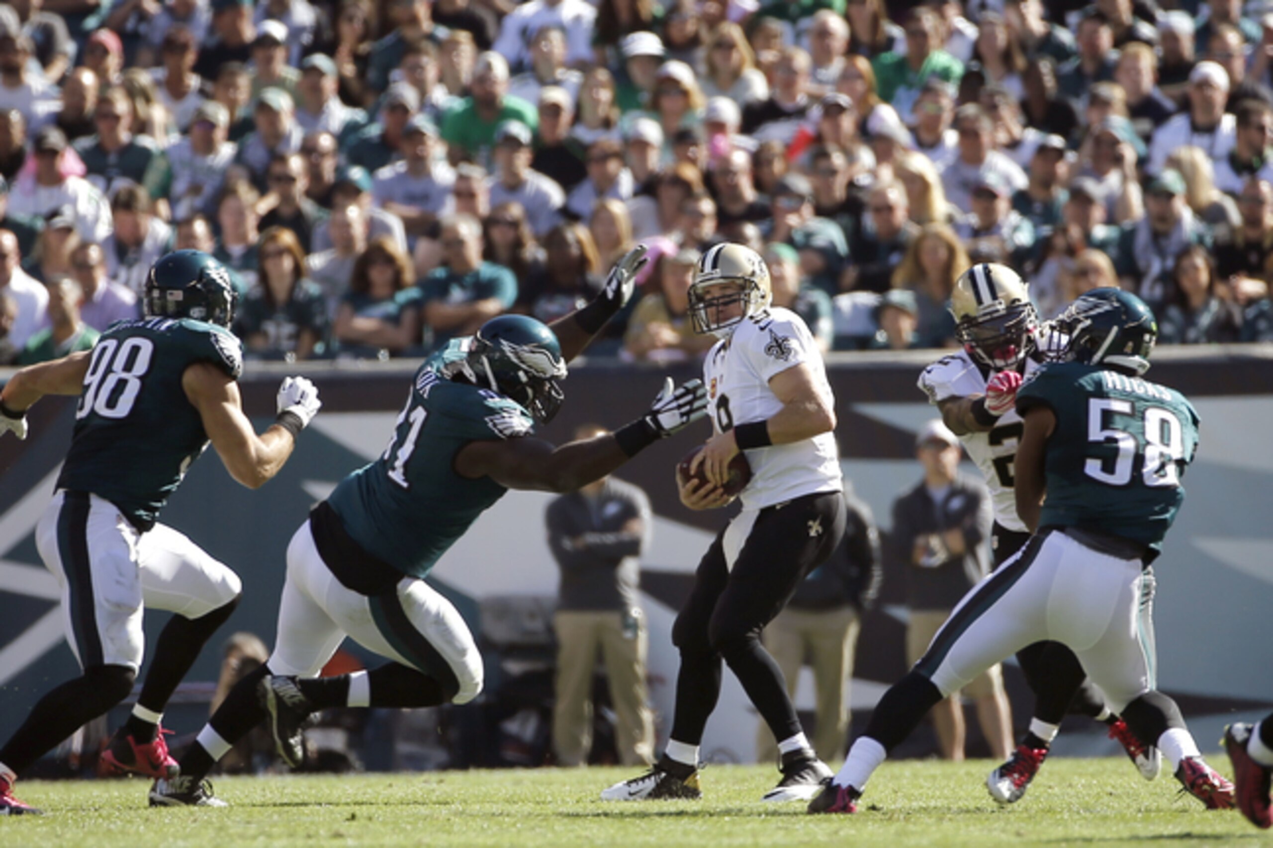 Cox chases down Brees for his first sack of the day. Cox chases down Brees for his first sack of the day.